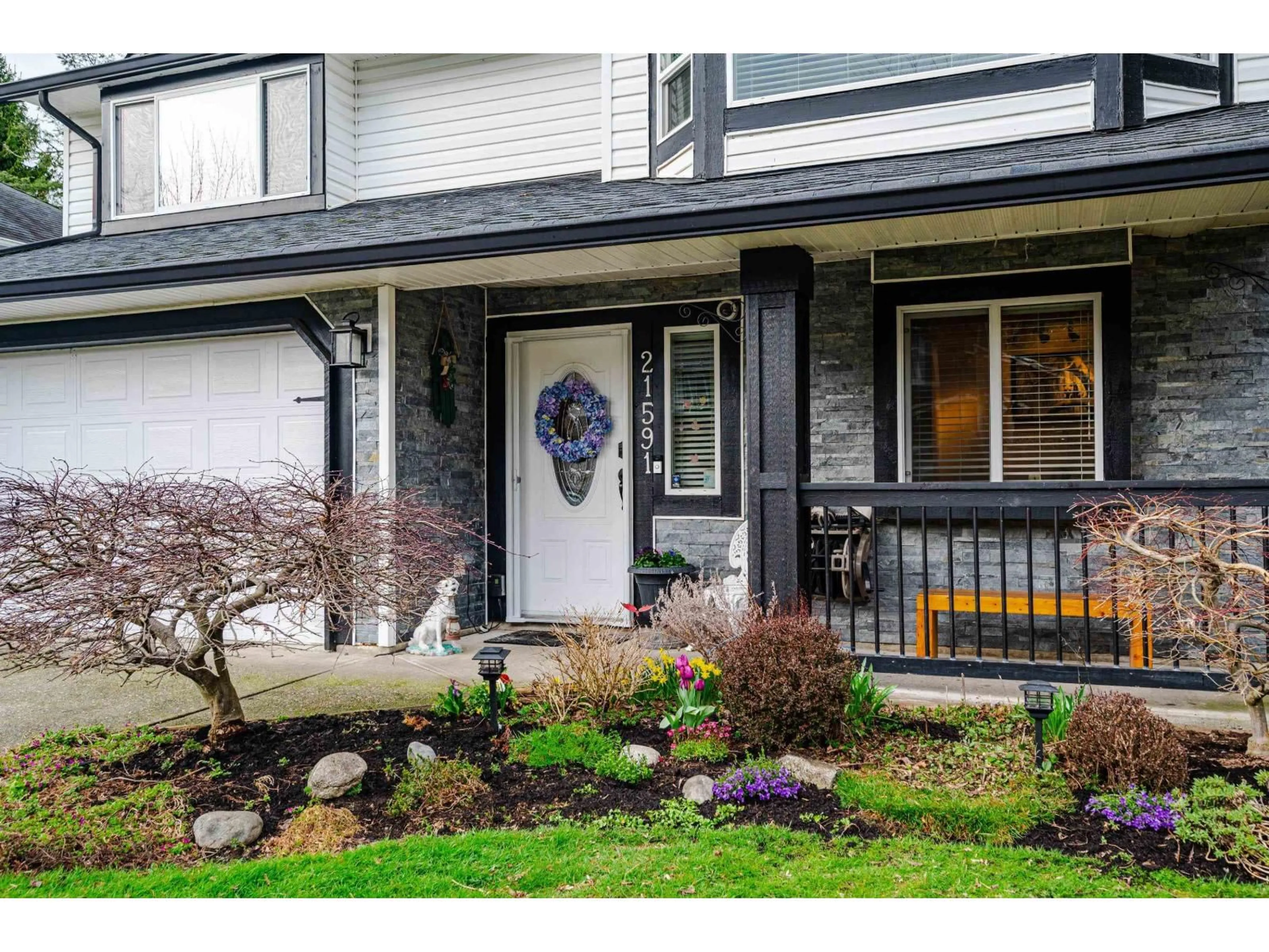 Home with vinyl exterior material, street for 21591 93A, Langley British Columbia V1M2H7