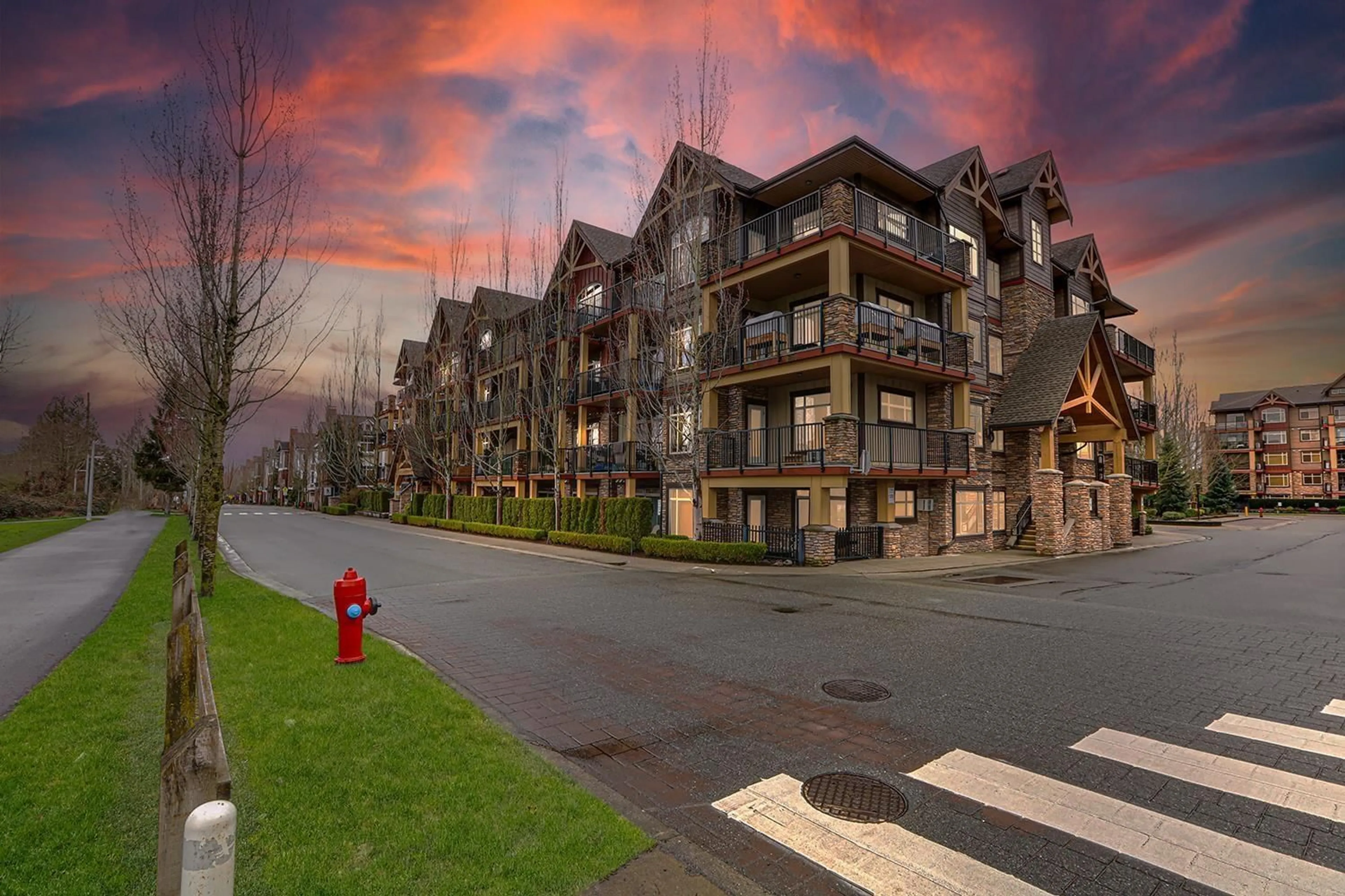 A pic from outside/outdoor area/front of a property/back of a property/a pic from drone, street for 404 - 8328 207A, Langley British Columbia V2Y0K5
