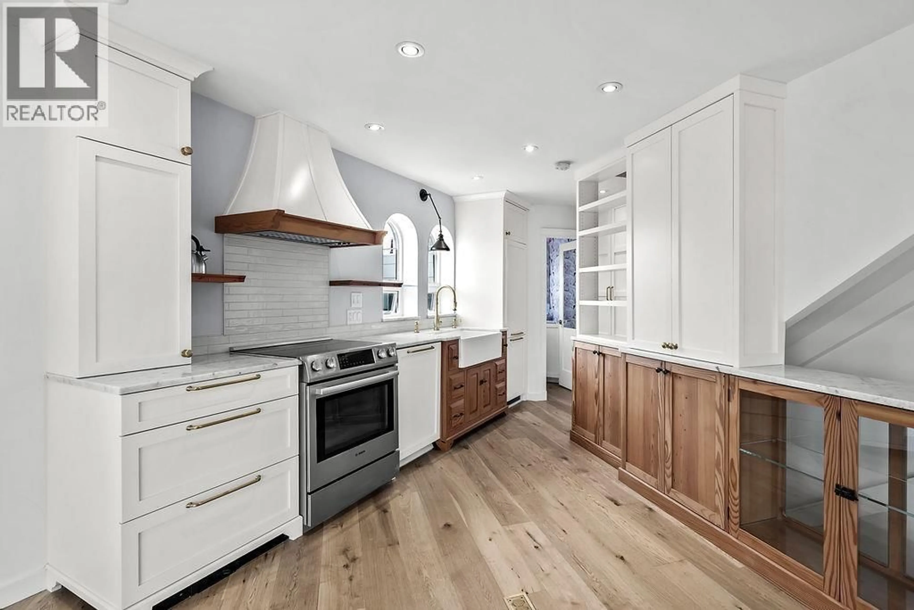 Open concept kitchen, wood/laminate floor for 2420 BIRCH STREET, Vancouver British Columbia V6H3X9