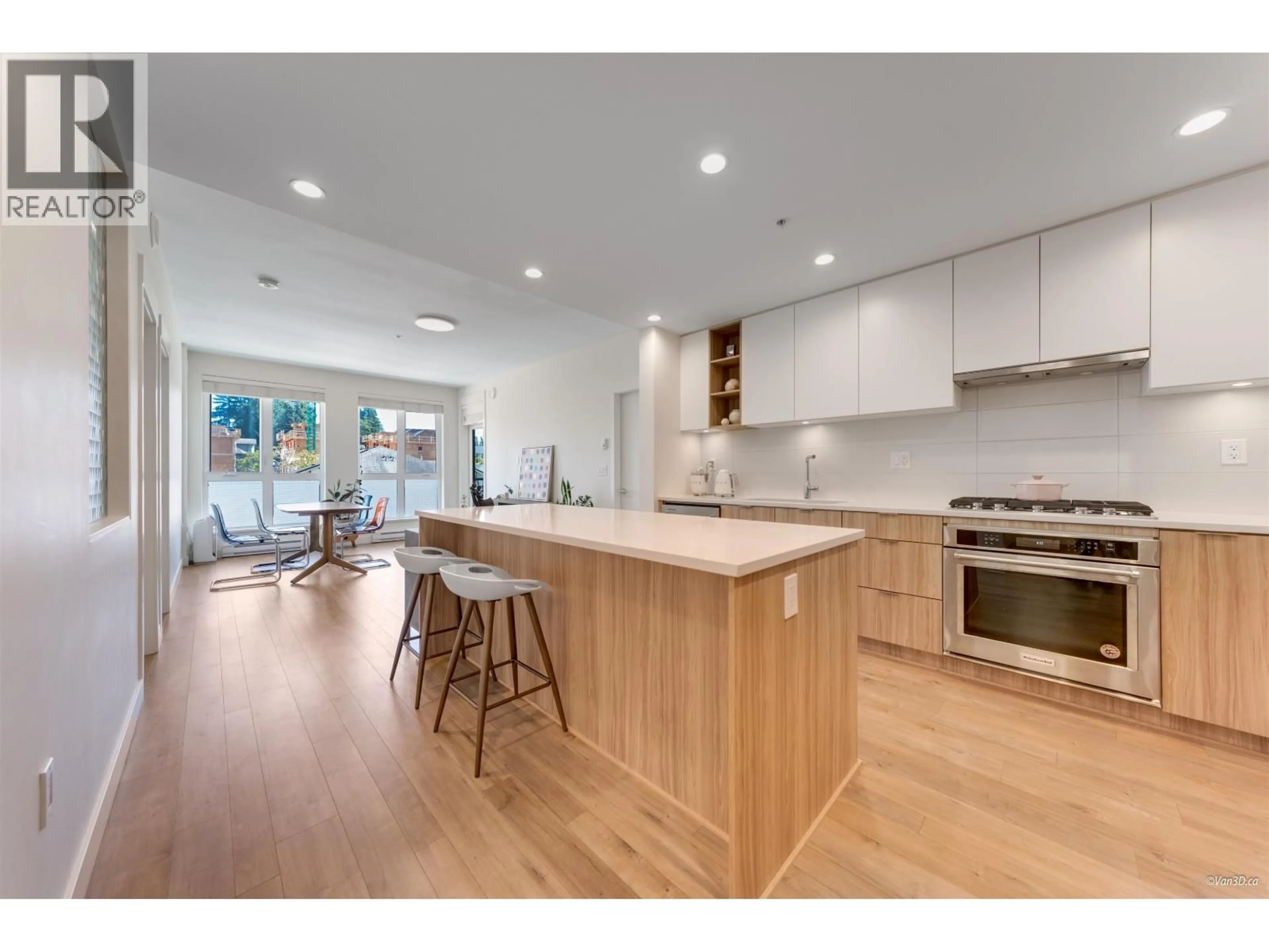 Open concept kitchen, wood/laminate floor for 319 - 750 DOGWOOD STREET, Coquitlam British Columbia V3J4B7
