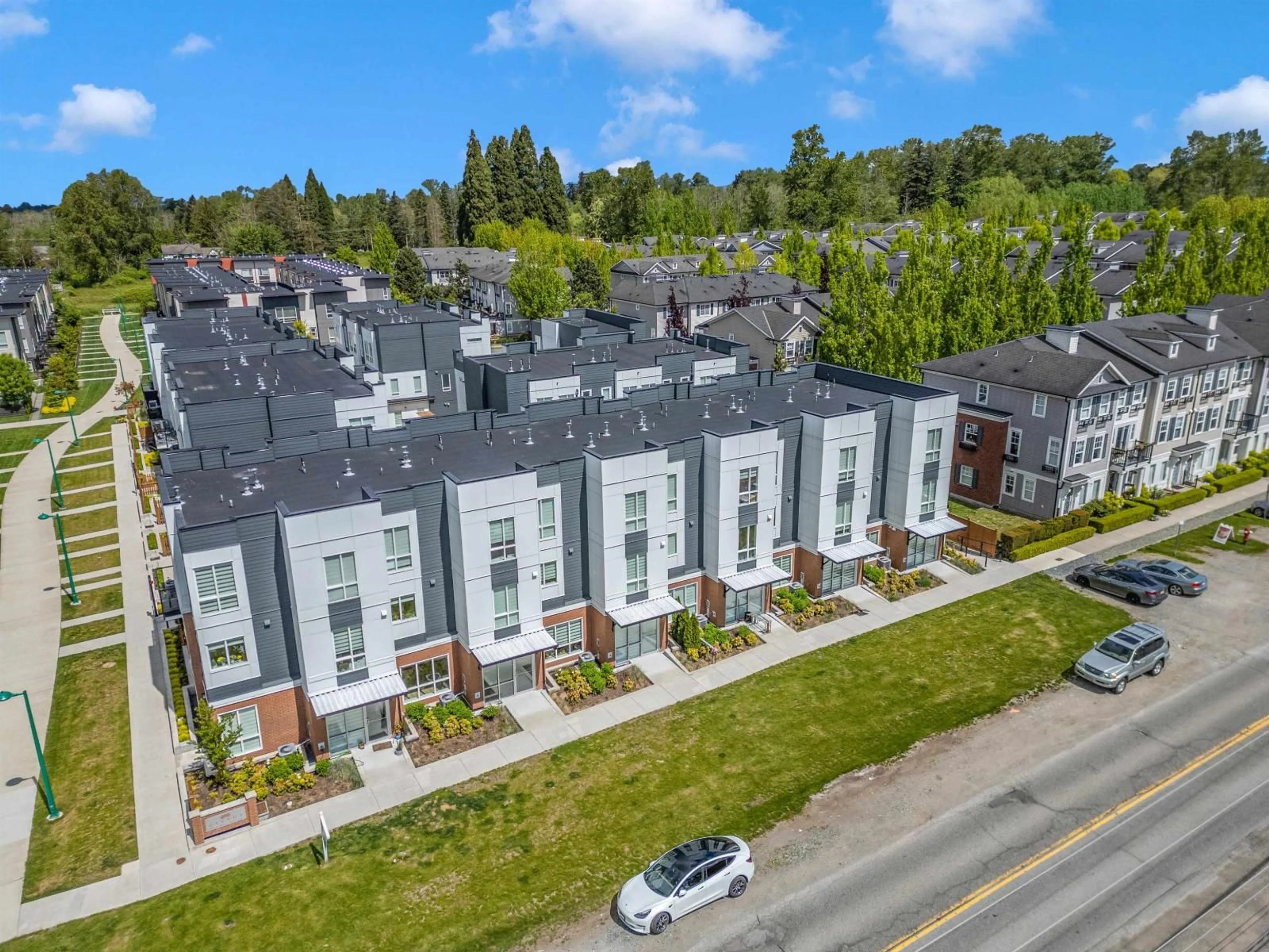 A pic from outside/outdoor area/front of a property/back of a property/a pic from drone, street for 36 - 18855 72, Surrey British Columbia V4N6V6
