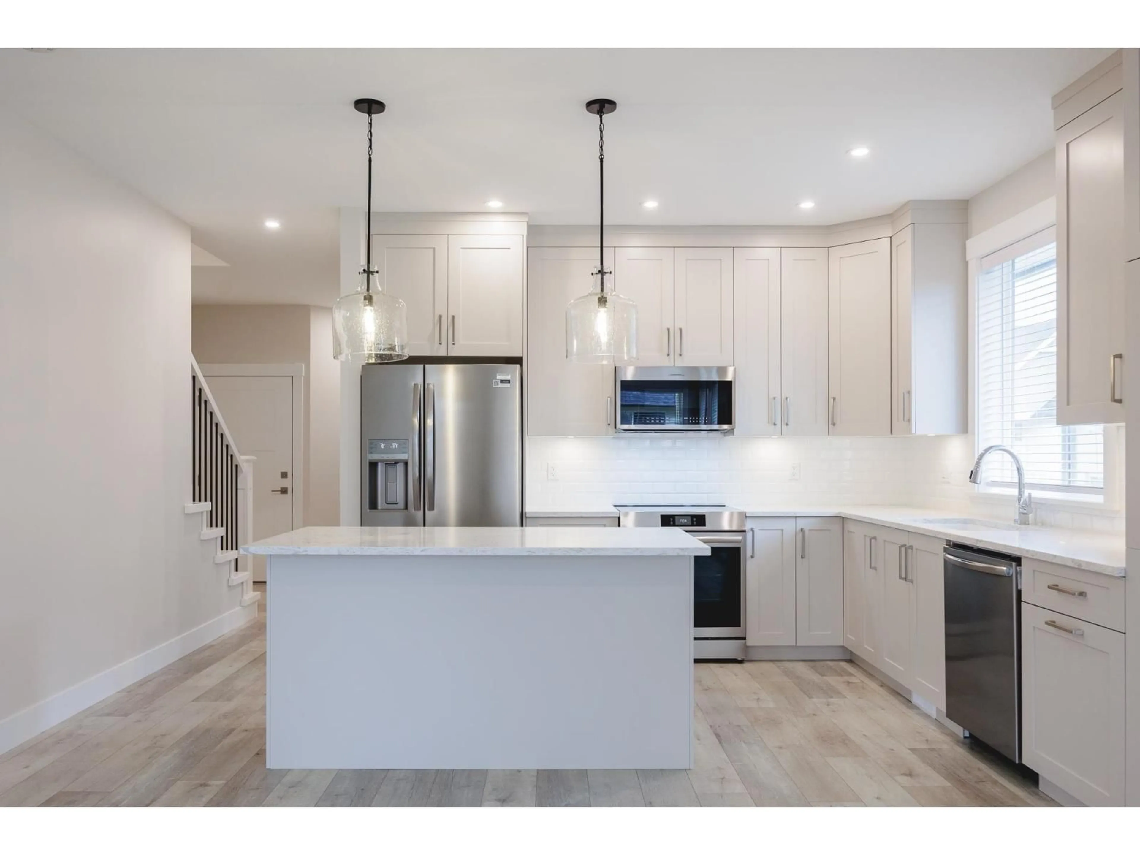 Open concept kitchen, unknown for 102 - 6211 CHILLIWACK RIVER ROAD, Chilliwack British Columbia V2R6A7