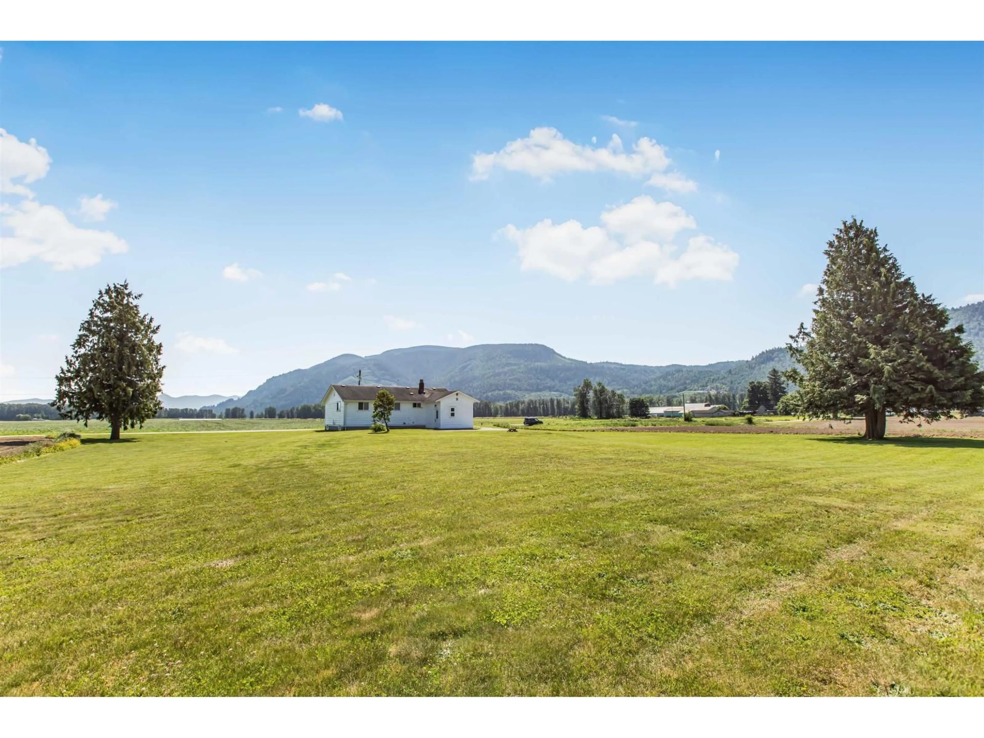 A pic from outside/outdoor area/front of a property/back of a property/a pic from drone, mountain view for 7735 NEWTON, Mission British Columbia V0M1H0