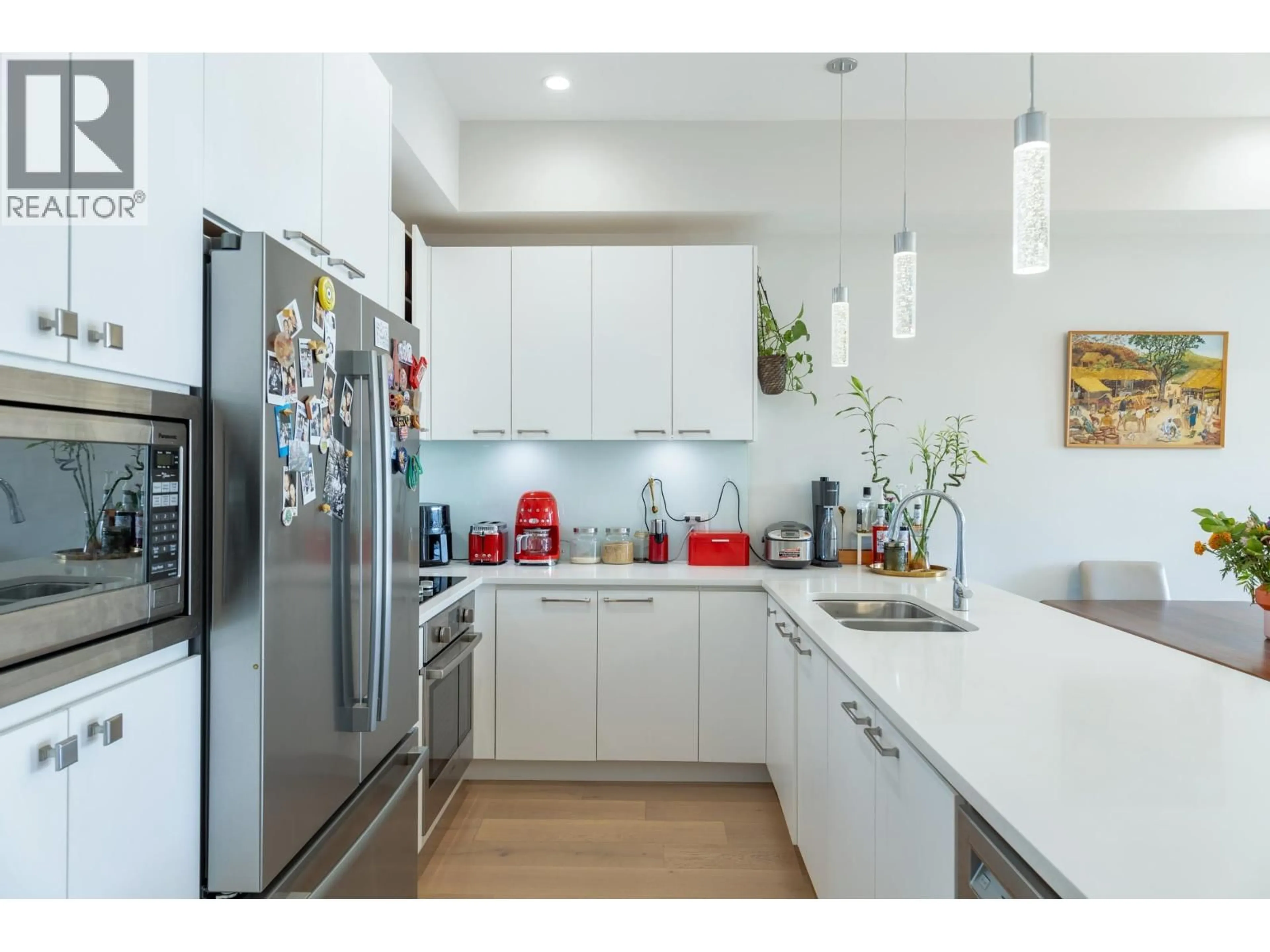 Contemporary kitchen, unknown for 205 - 1591 BOWSER AVENUE, North Vancouver British Columbia V7P2Y4