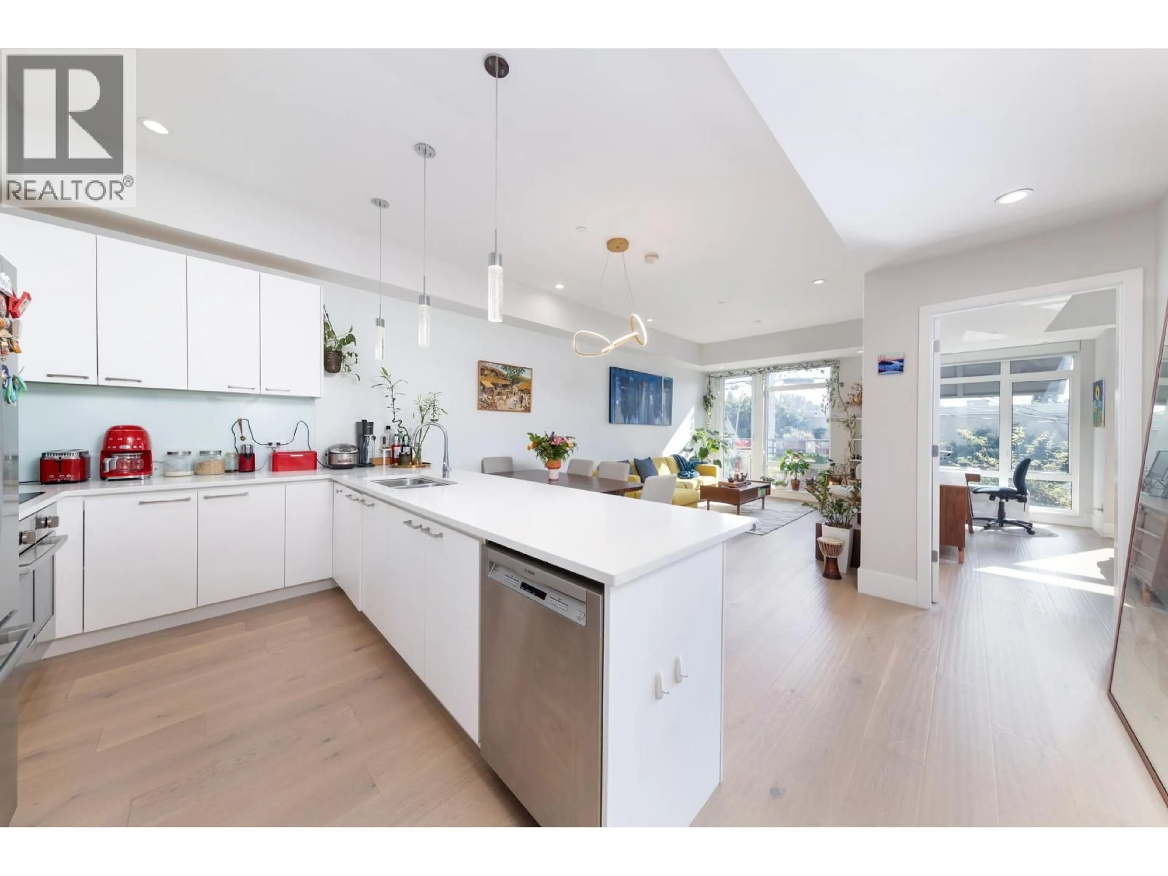 Open concept kitchen, ceramic/tile floor for 205 - 1591 BOWSER AVENUE, North Vancouver British Columbia V7P2Y4