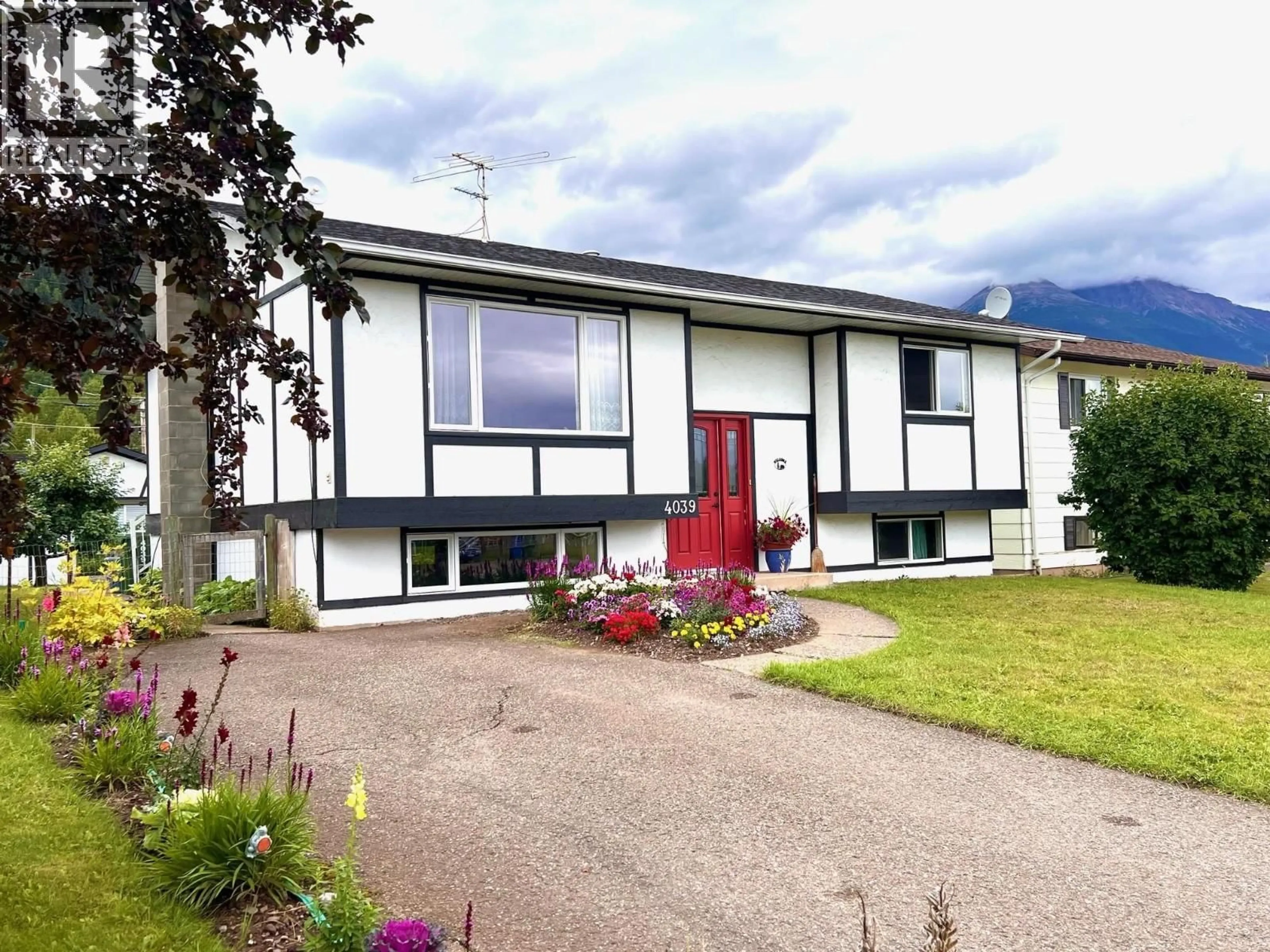 Home with vinyl exterior material, street for 4039 ALFRED AVENUE, Smithers British Columbia V0J2N0