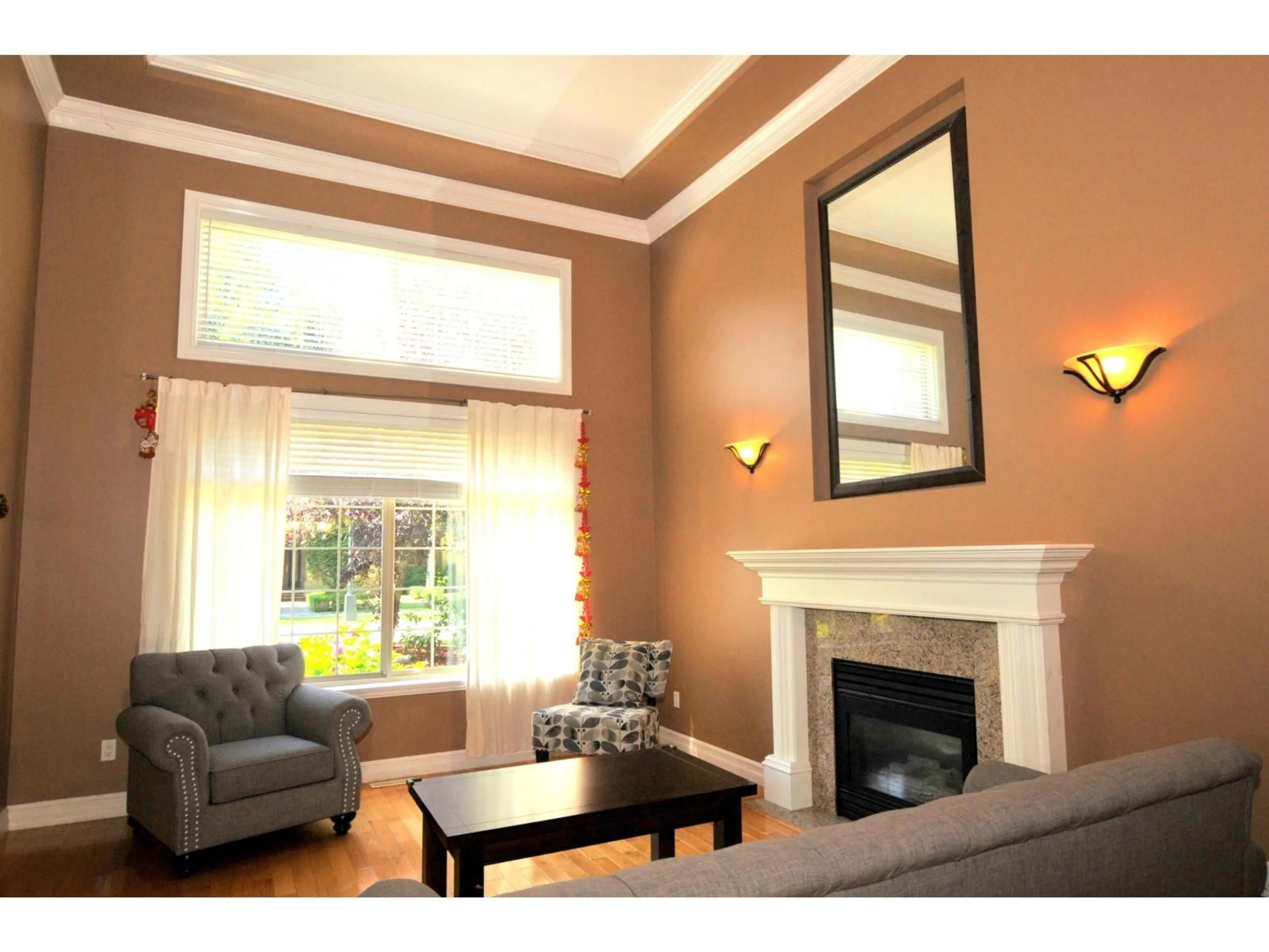 Living room with furniture, wood/laminate floor for 2132 139A, Surrey British Columbia V4A9V4