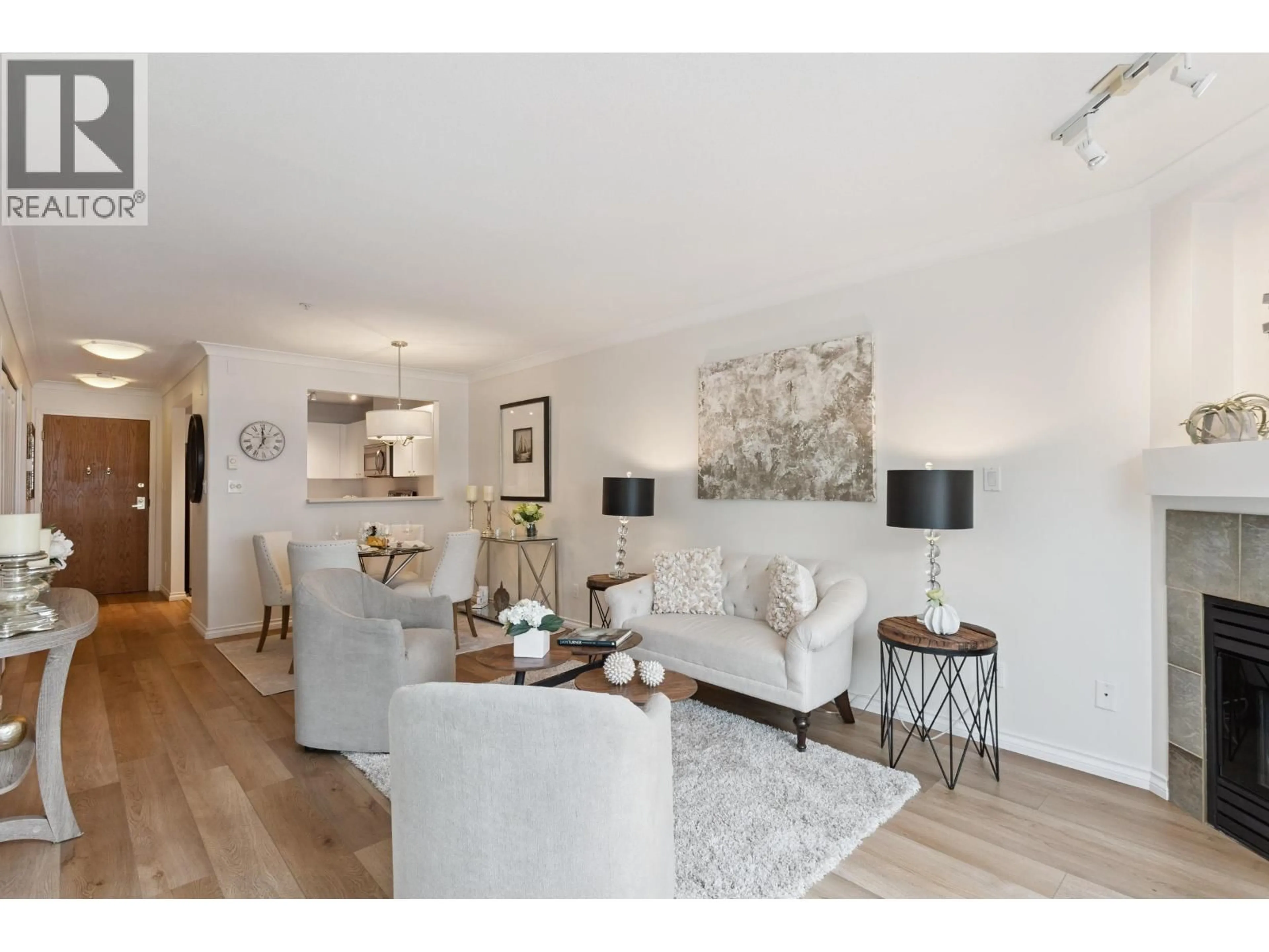 Living room with furniture, wood/laminate floor for 305 - 3590 26TH AVENUE, Vancouver British Columbia V6S1N9