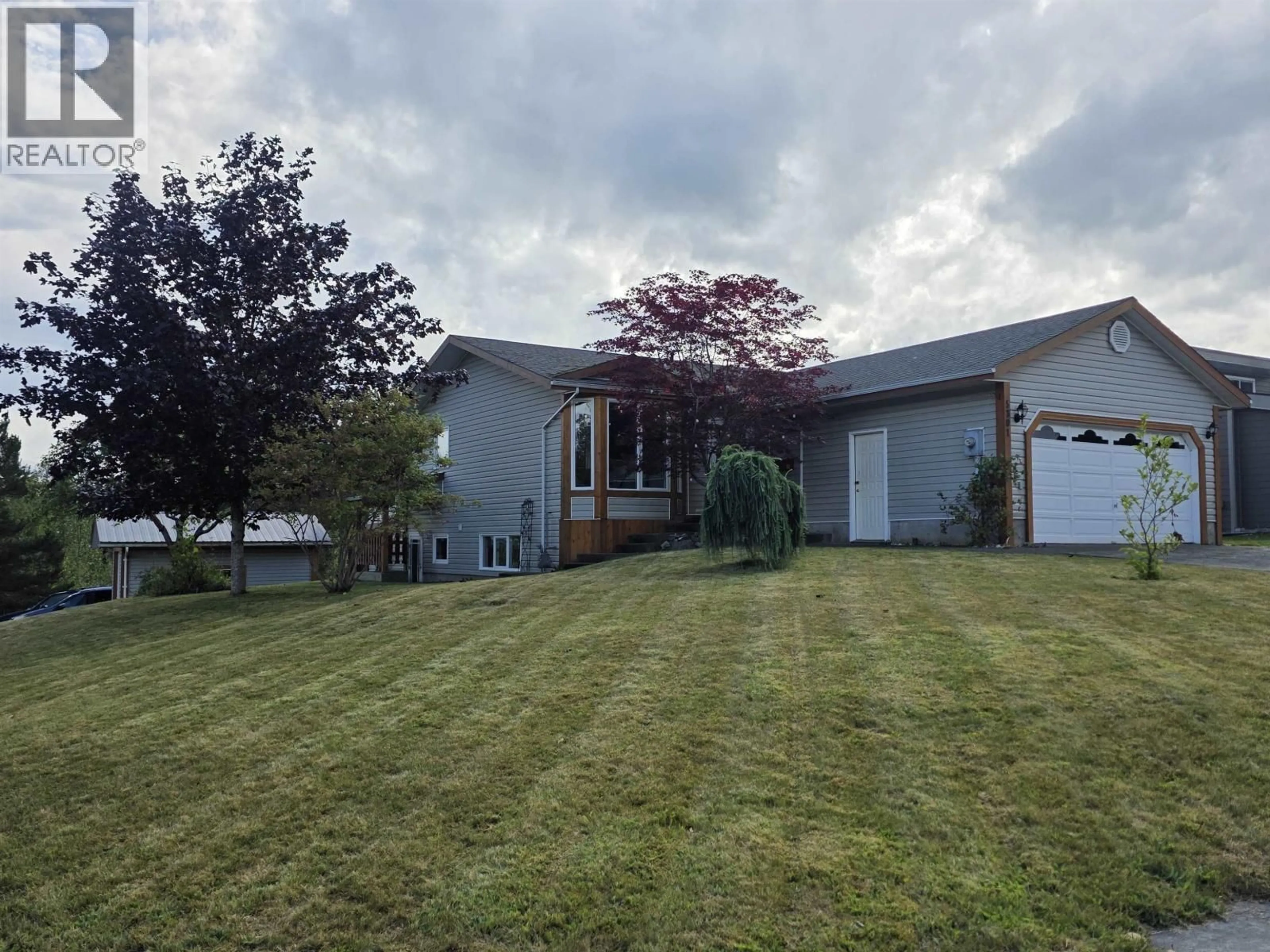 A pic from outside/outdoor area/front of a property/back of a property/a pic from drone, unknown for 5301 MOUNTAIN VISTA DRIVE, Terrace British Columbia V8G4X4