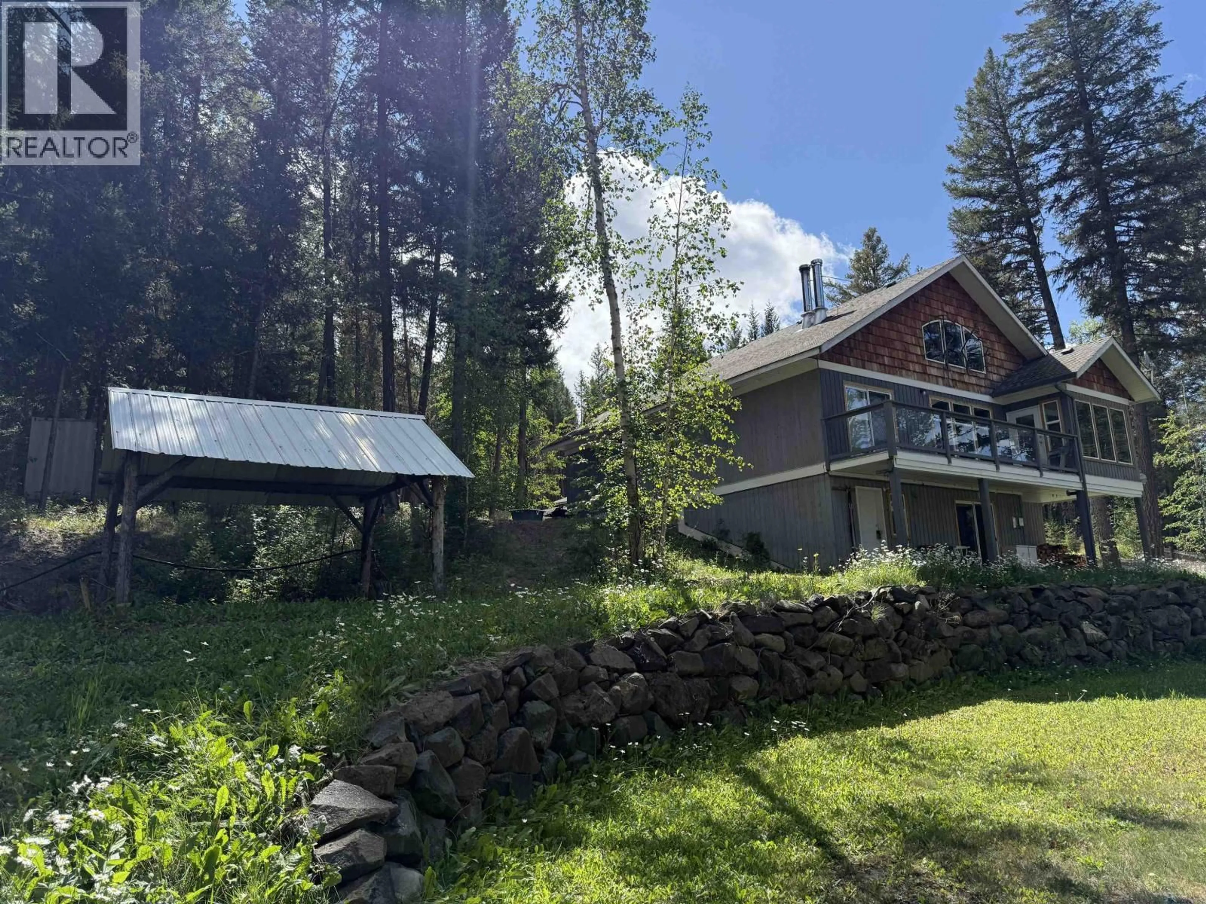 A pic from outside/outdoor area/front of a property/back of a property/a pic from drone, forest/trees view for 6513 MONETTE ROAD, 100 Mile House British Columbia V0K1K0