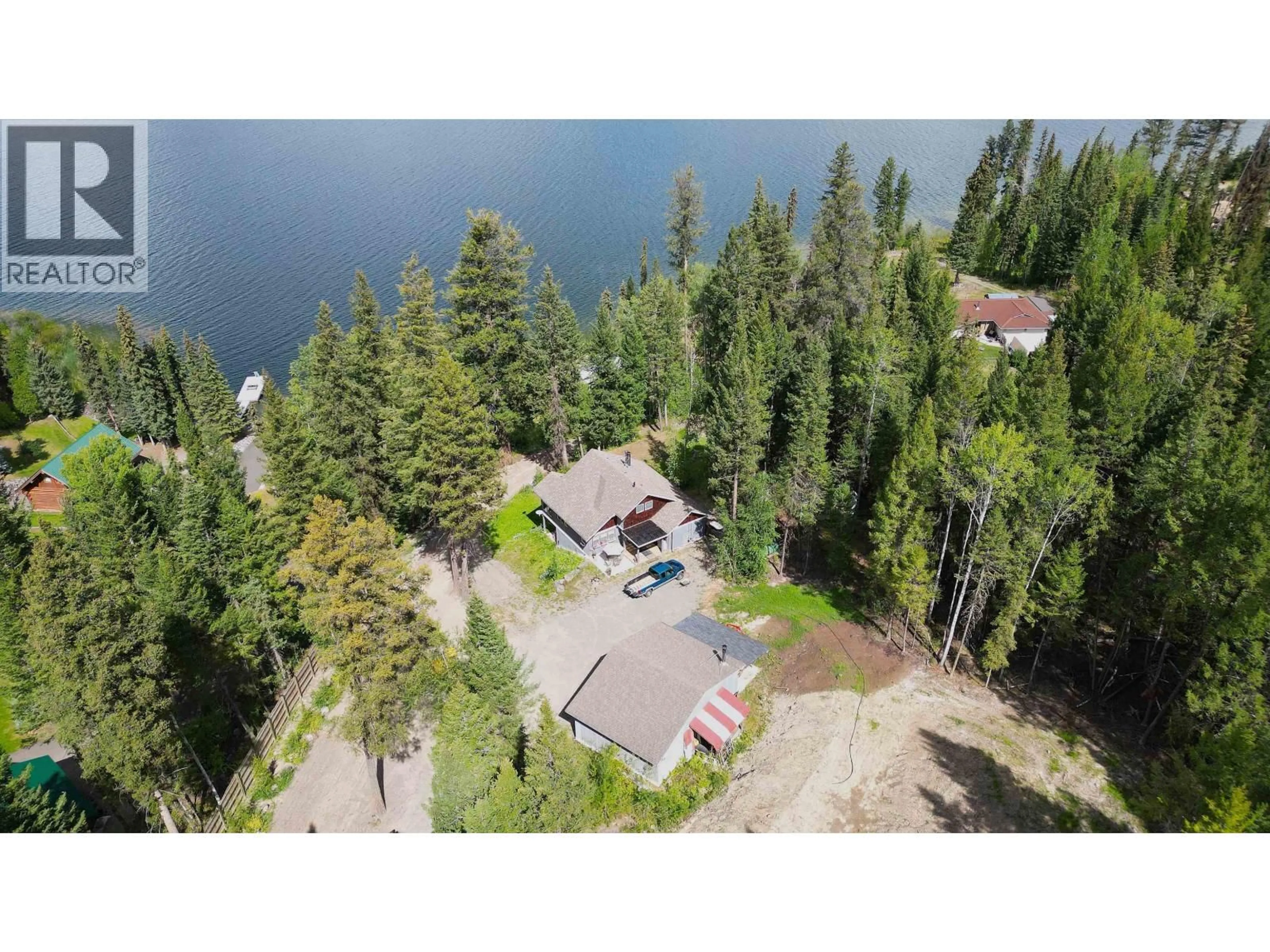 A pic from outside/outdoor area/front of a property/back of a property/a pic from drone, water/lake/river/ocean view for 6513 MONETTE ROAD, 100 Mile House British Columbia V0K1K0