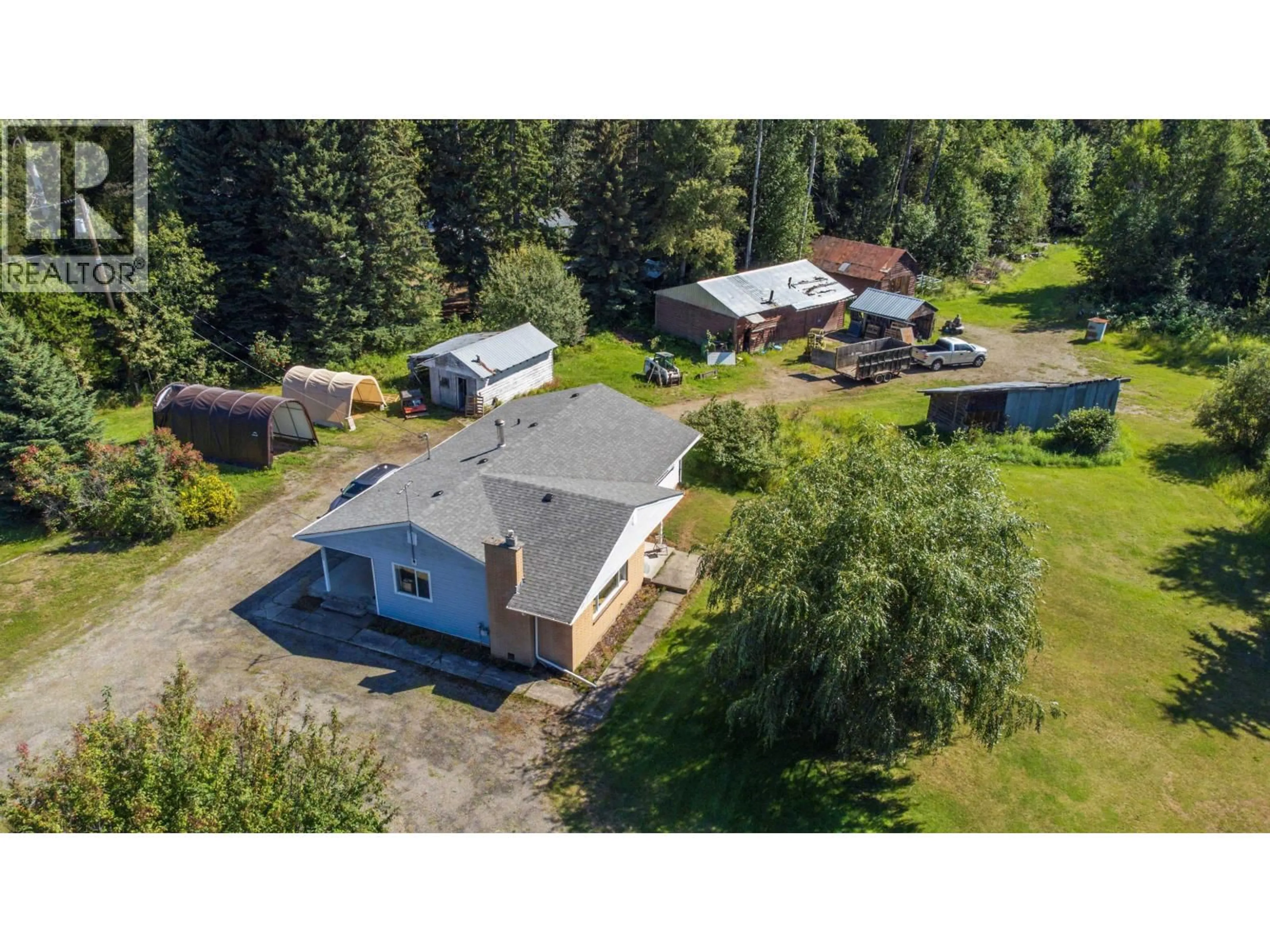 A pic from outside/outdoor area/front of a property/back of a property/a pic from drone, street for 2535 15 MILE ROAD, Prince George British Columbia V2N5Y6