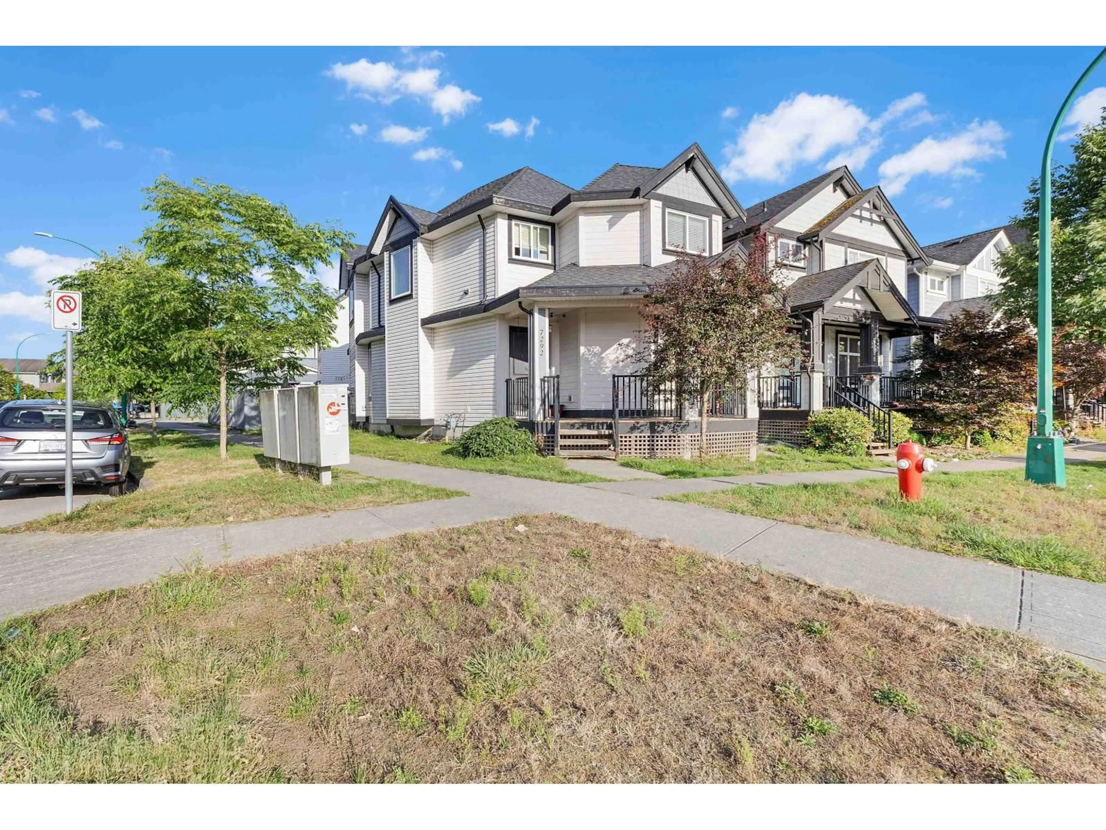 A pic from outside/outdoor area/front of a property/back of a property/a pic from drone, street for 7292 195A, Surrey British Columbia V4N3E8