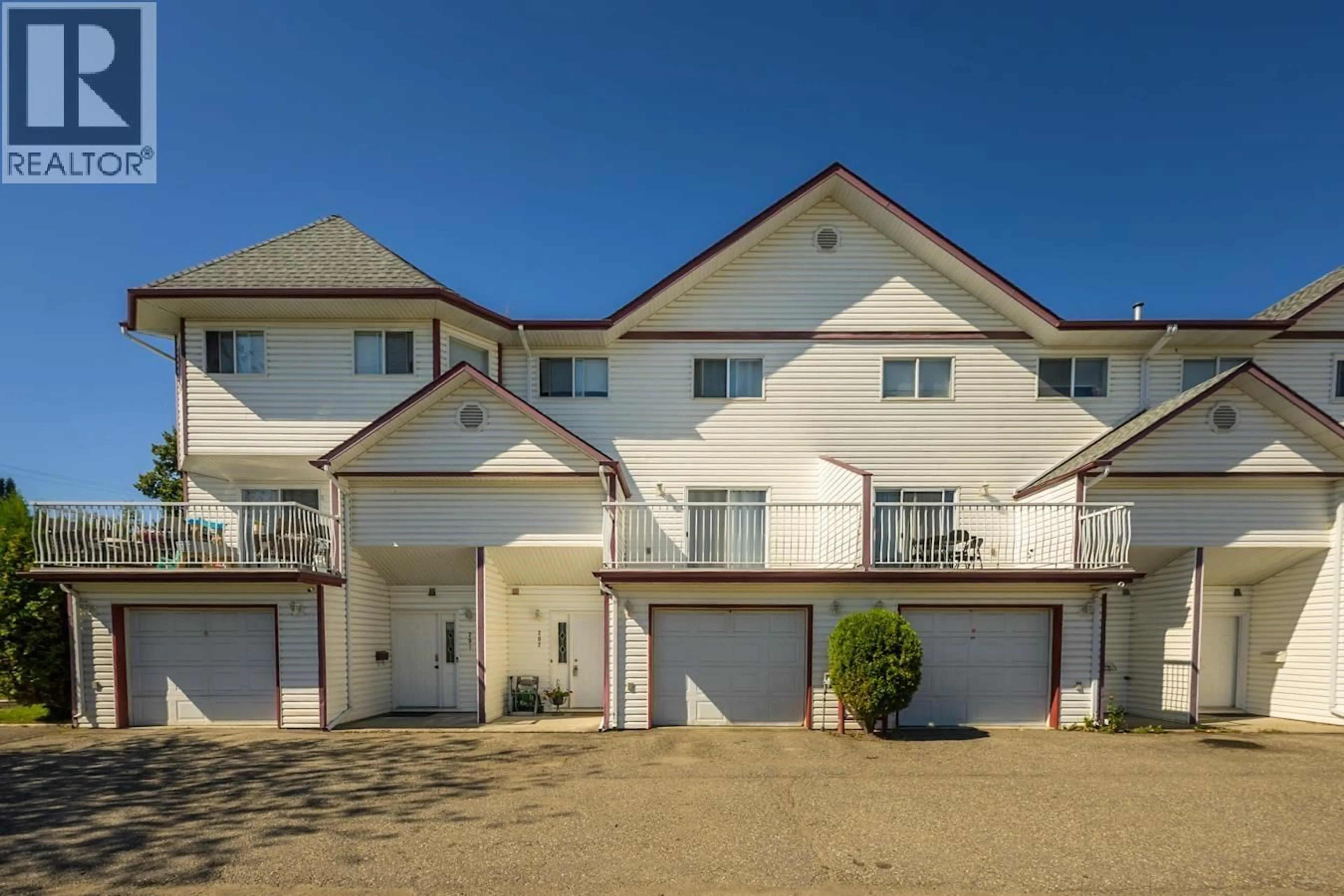 A pic from outside/outdoor area/front of a property/back of a property/a pic from drone, street for 202 - 3363 WESTWOOD DRIVE, Prince George British Columbia V2N1S4