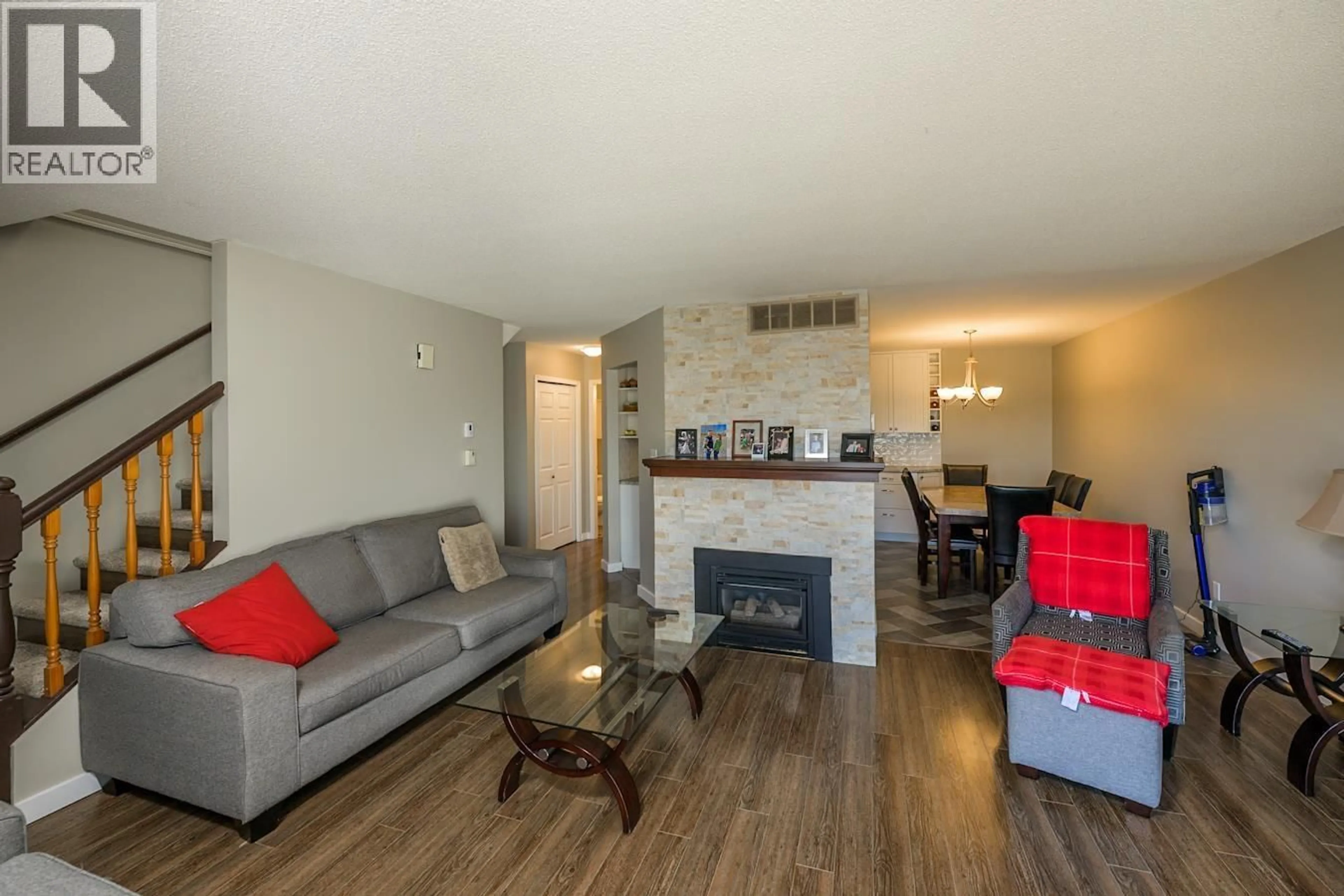 Living room with furniture, wood/laminate floor for 202 - 3363 WESTWOOD DRIVE, Prince George British Columbia V2N1S4