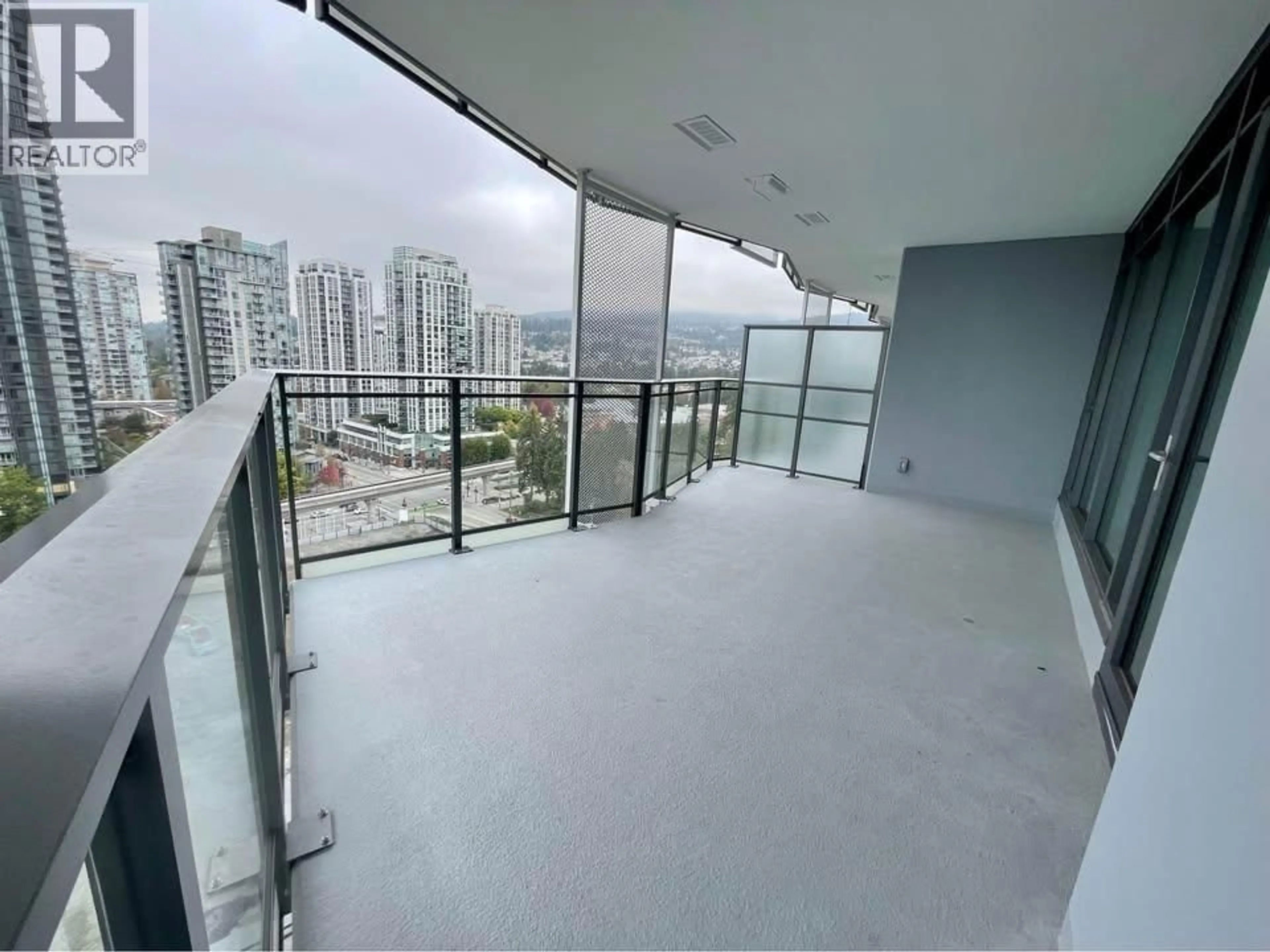 Balcony in the apartment, city buildings view from balcony for 1606 - 1182 WESTWOOD STREET, Coquitlam British Columbia V3B0T9