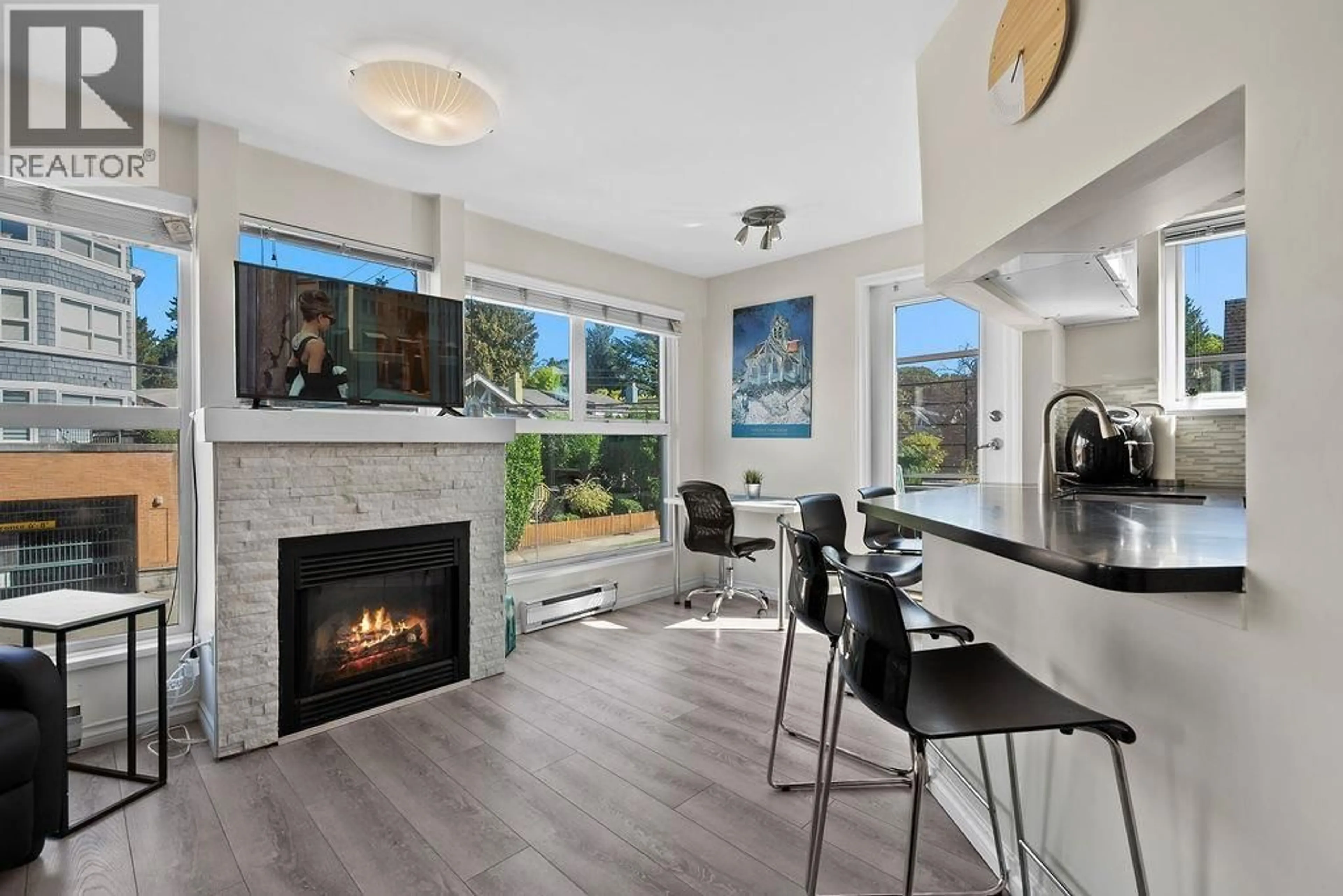 Open concept kitchen, ceramic/tile floor for 208 - 2025 STEPHENS STREET, Vancouver British Columbia V6K3W2