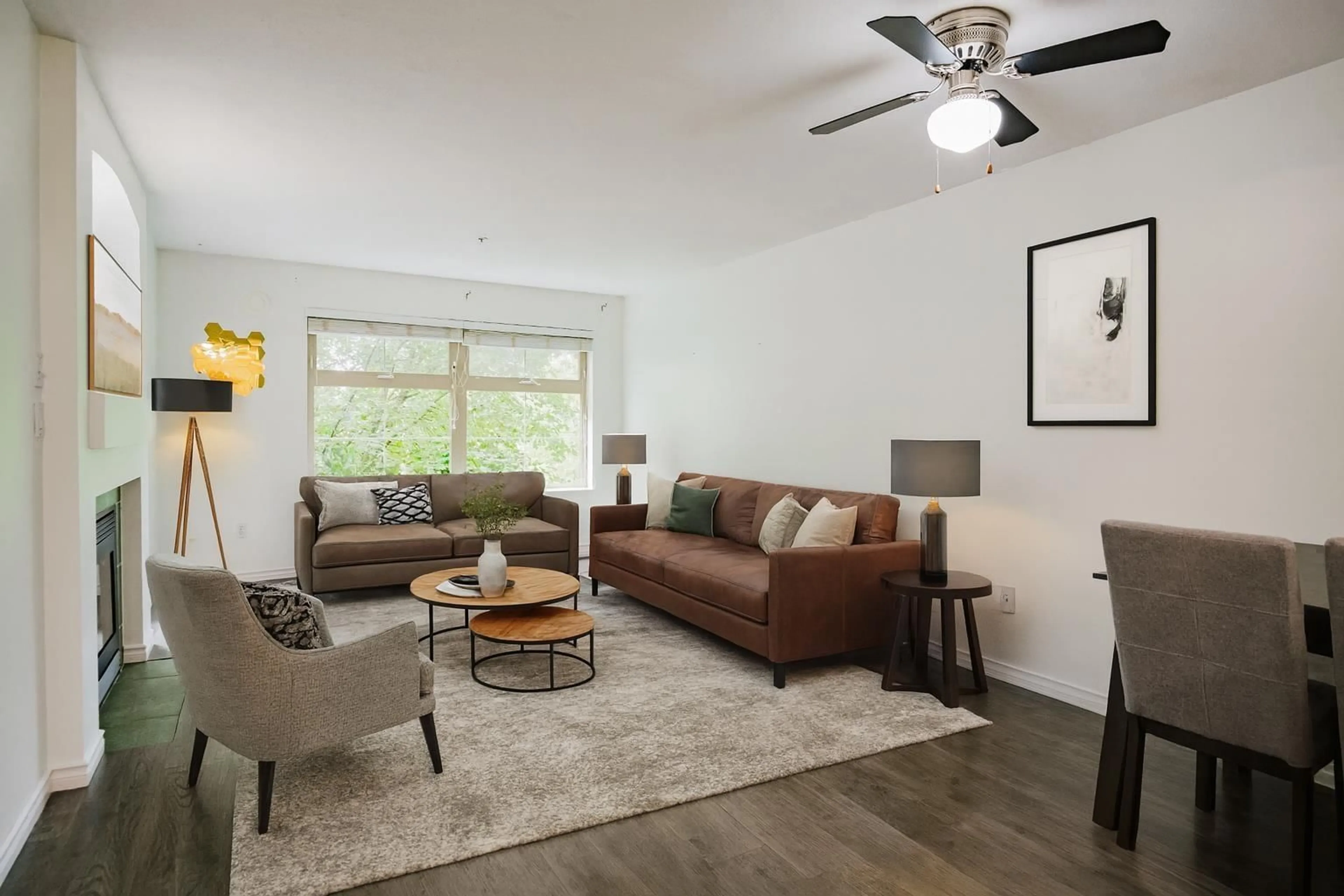 Living room with furniture, wood/laminate floor for 307 - 15210 GUILDFORD, Surrey British Columbia V3R0X7