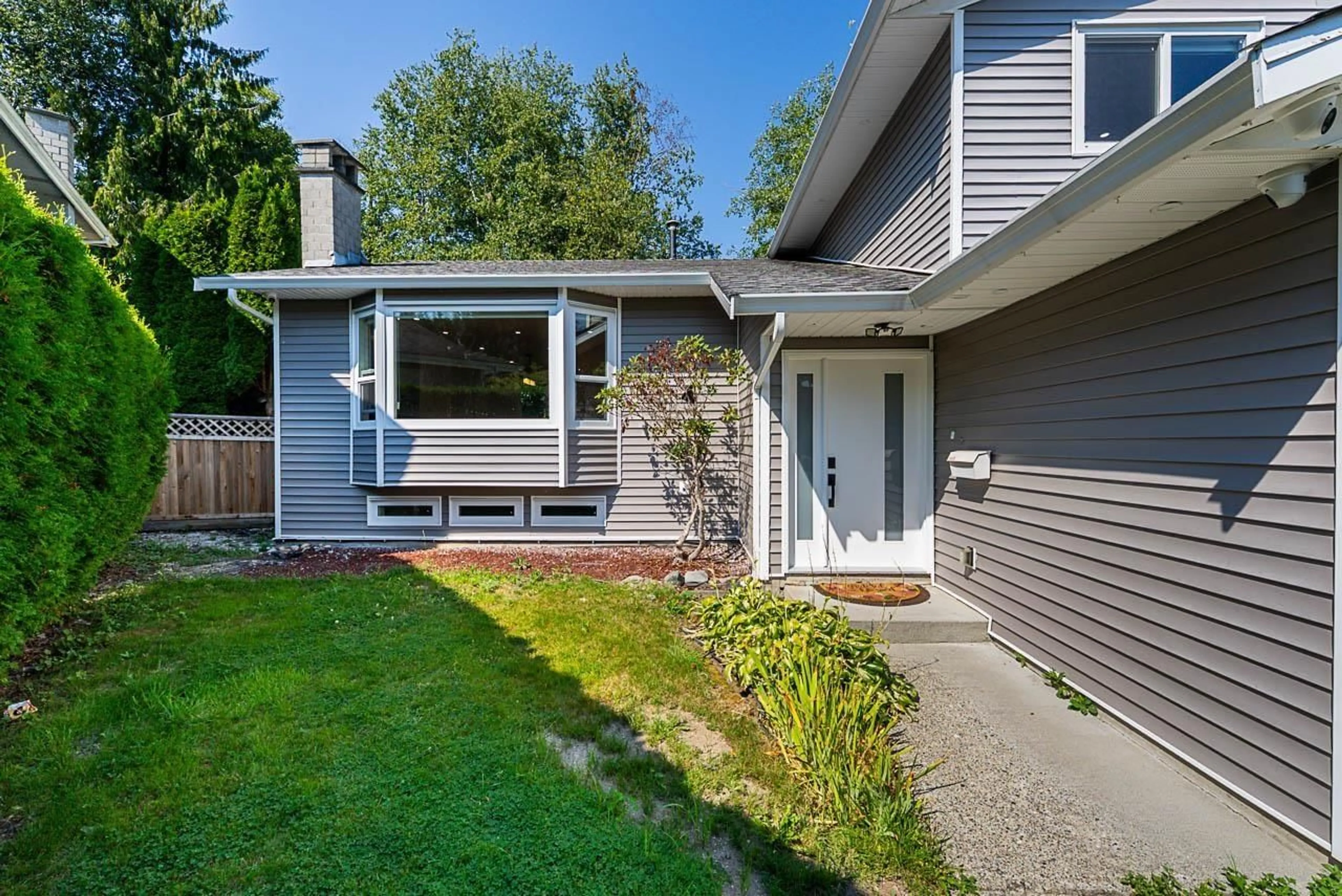 Home with vinyl exterior material, street for 13129 62B, Surrey British Columbia V3X1P4