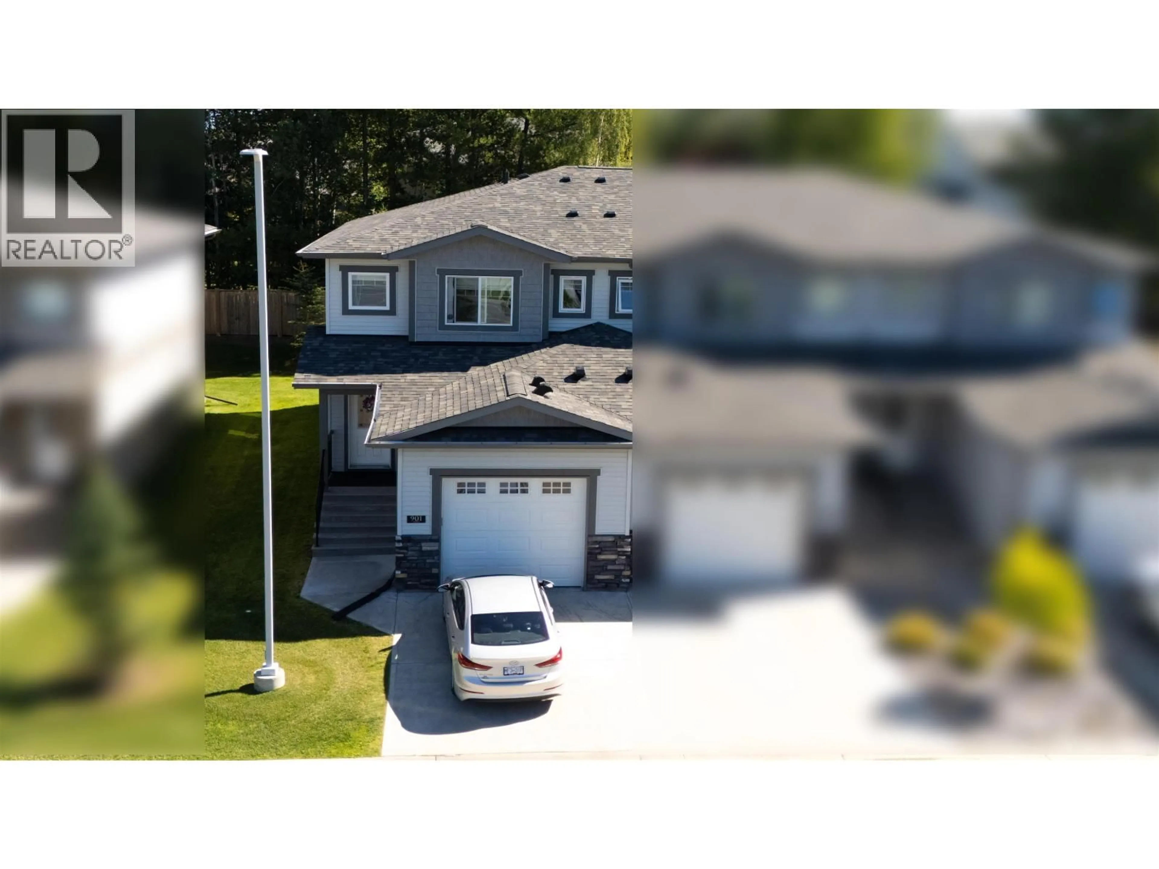 A pic from outside/outdoor area/front of a property/back of a property/a pic from drone, street for 901 - 6798 WESTGATE AVENUE, Prince George British Columbia V2N0H6
