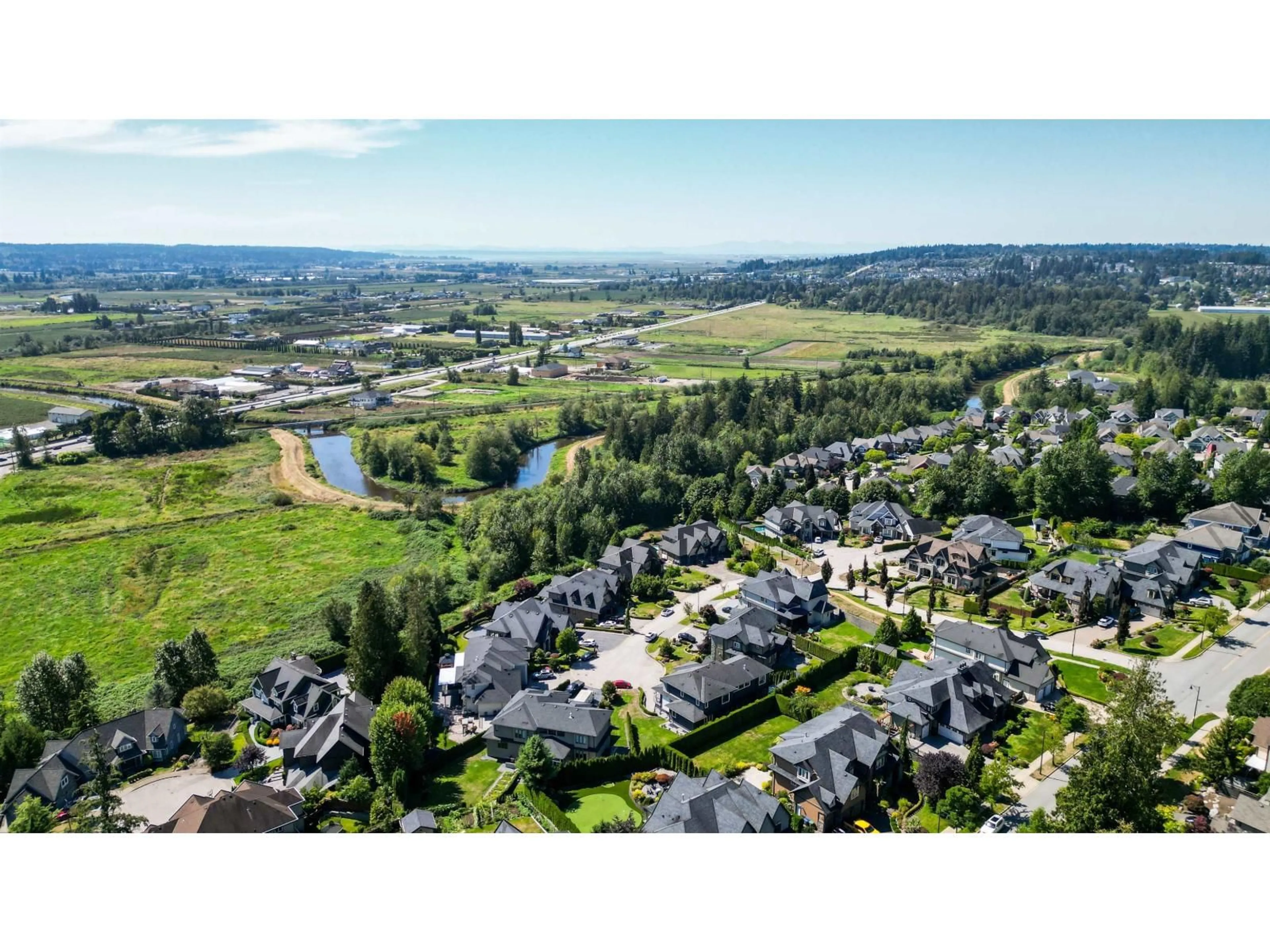 A pic from outside/outdoor area/front of a property/back of a property/a pic from drone, water/lake/river/ocean view for 16521 58, Surrey British Columbia V3S6P8