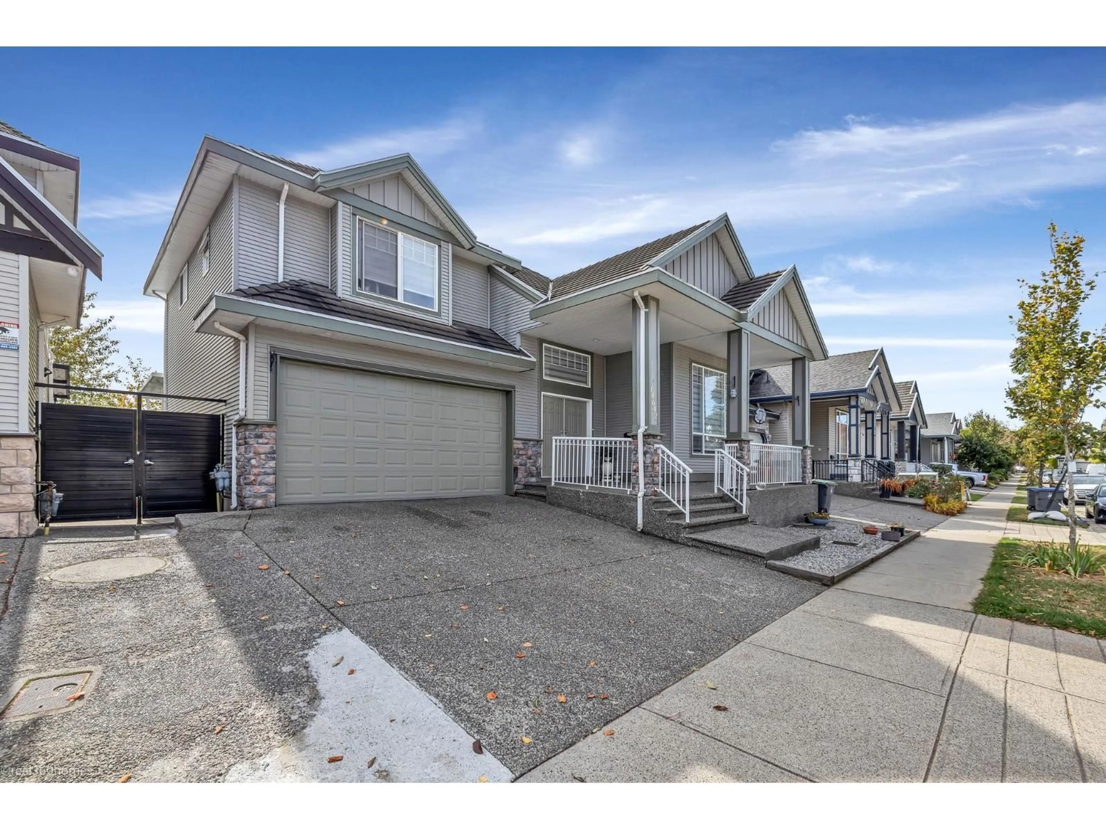 Home with vinyl exterior material, street for 14642 67A, Surrey British Columbia V3S0Z4