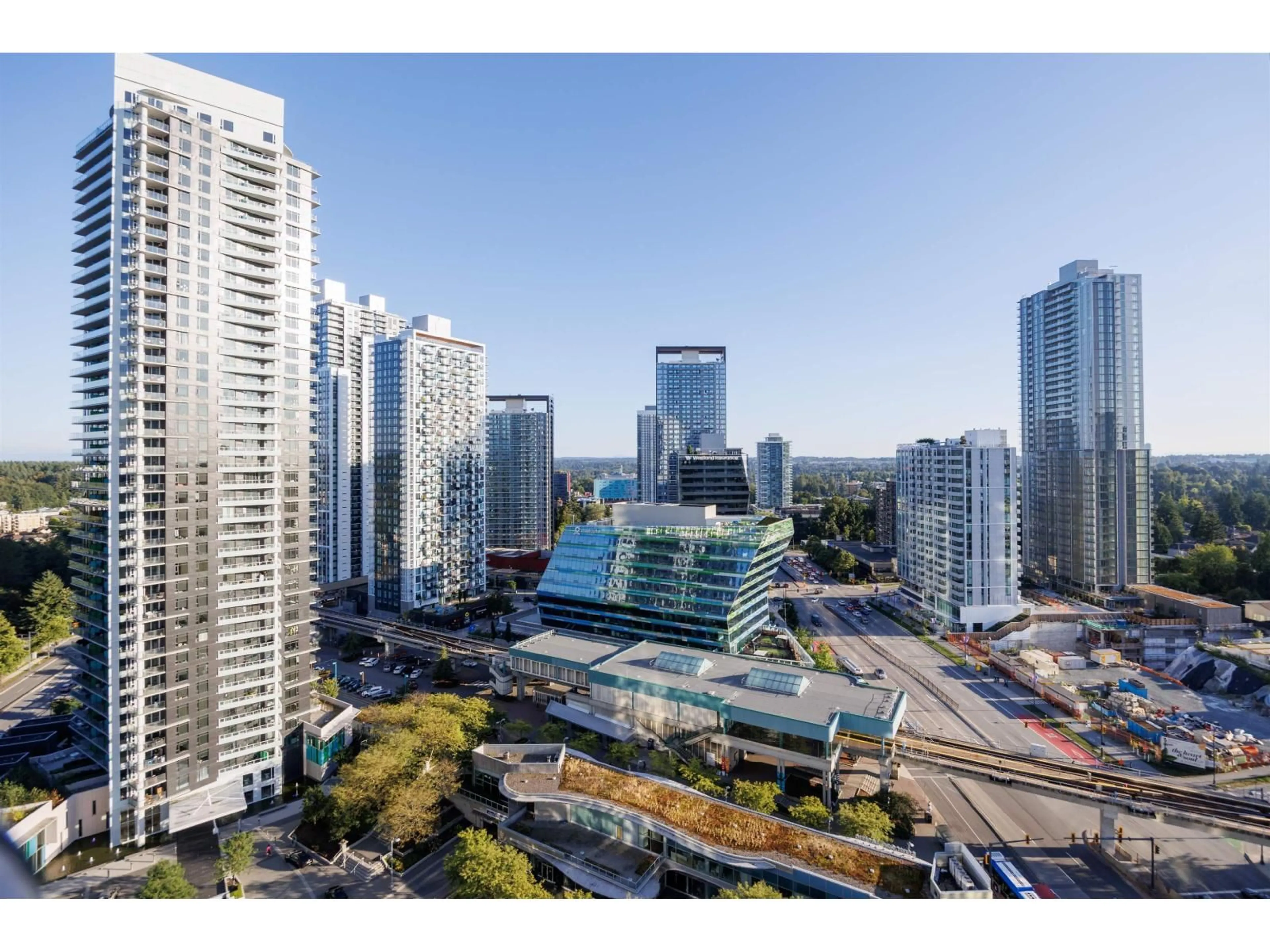A pic from outside/outdoor area/front of a property/back of a property/a pic from drone, city buildings view from balcony for 2207 - 13618 100, Surrey British Columbia V3T0A8