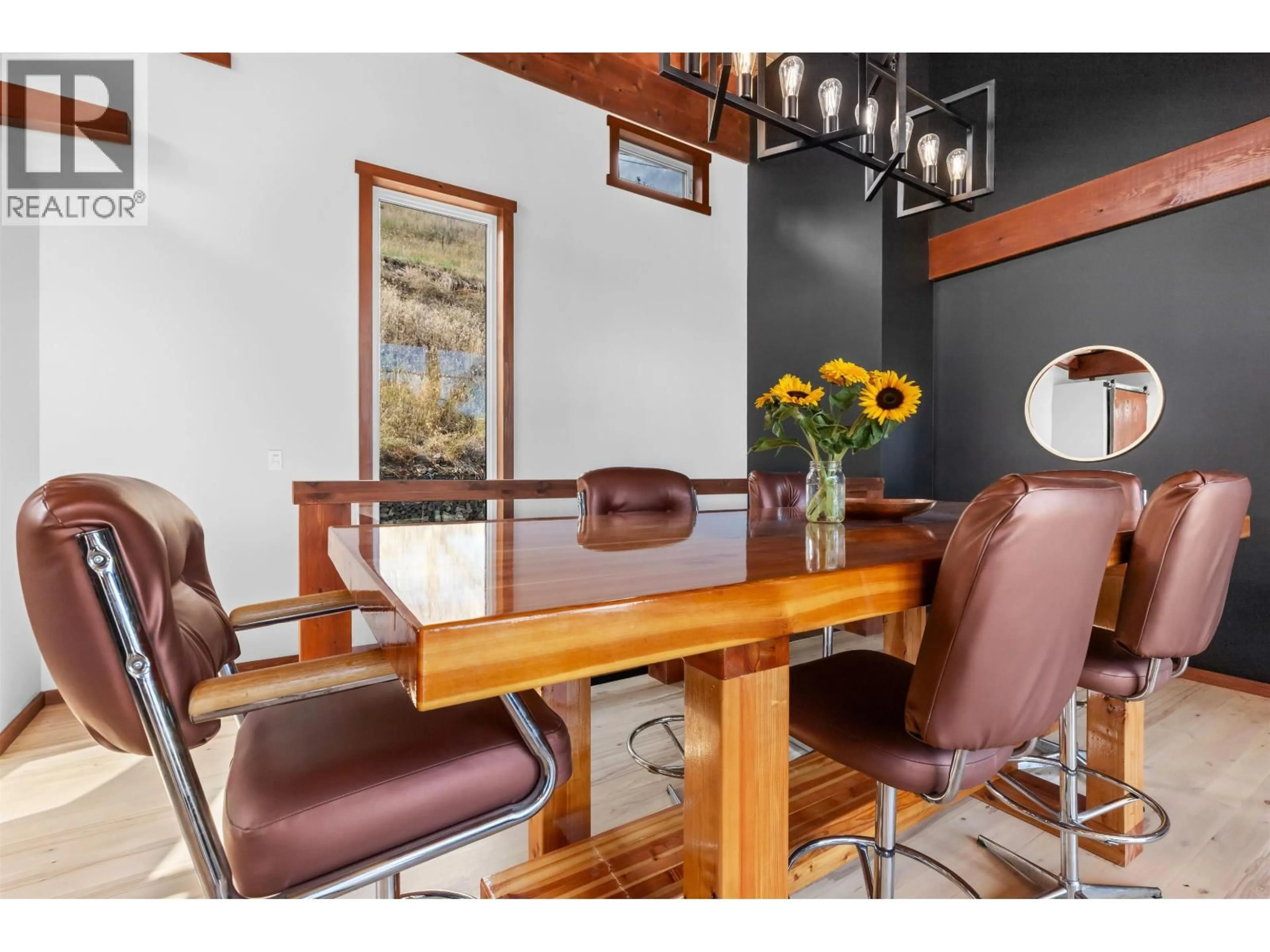 Dining room, wood/laminate floor for 1917 BASS ROAD, Williams Lake British Columbia V2G5G6