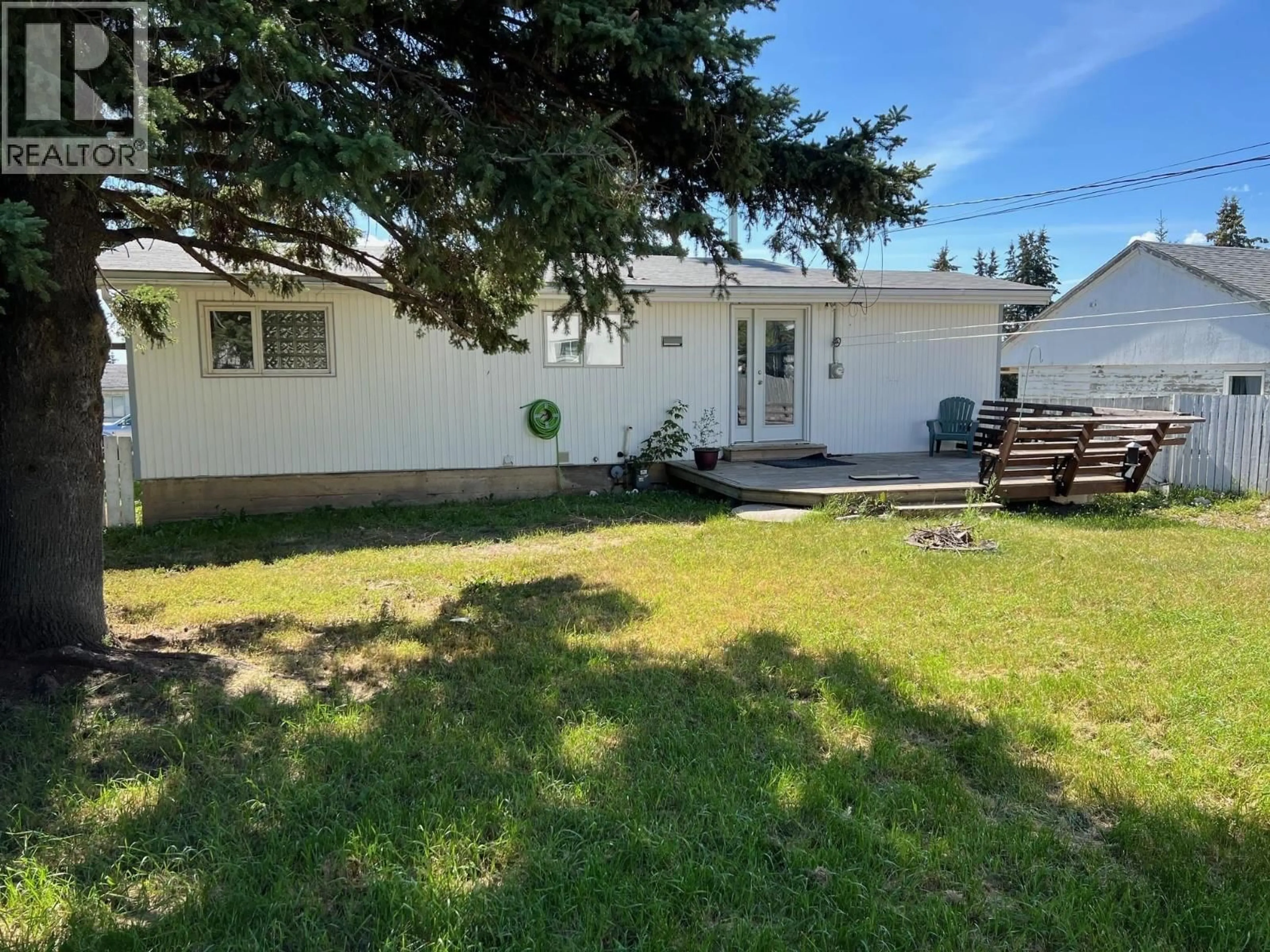 A pic from outside/outdoor area/front of a property/back of a property/a pic from drone, unknown for 9312 97 AVENUE, Fort St. John British Columbia V1J1M6