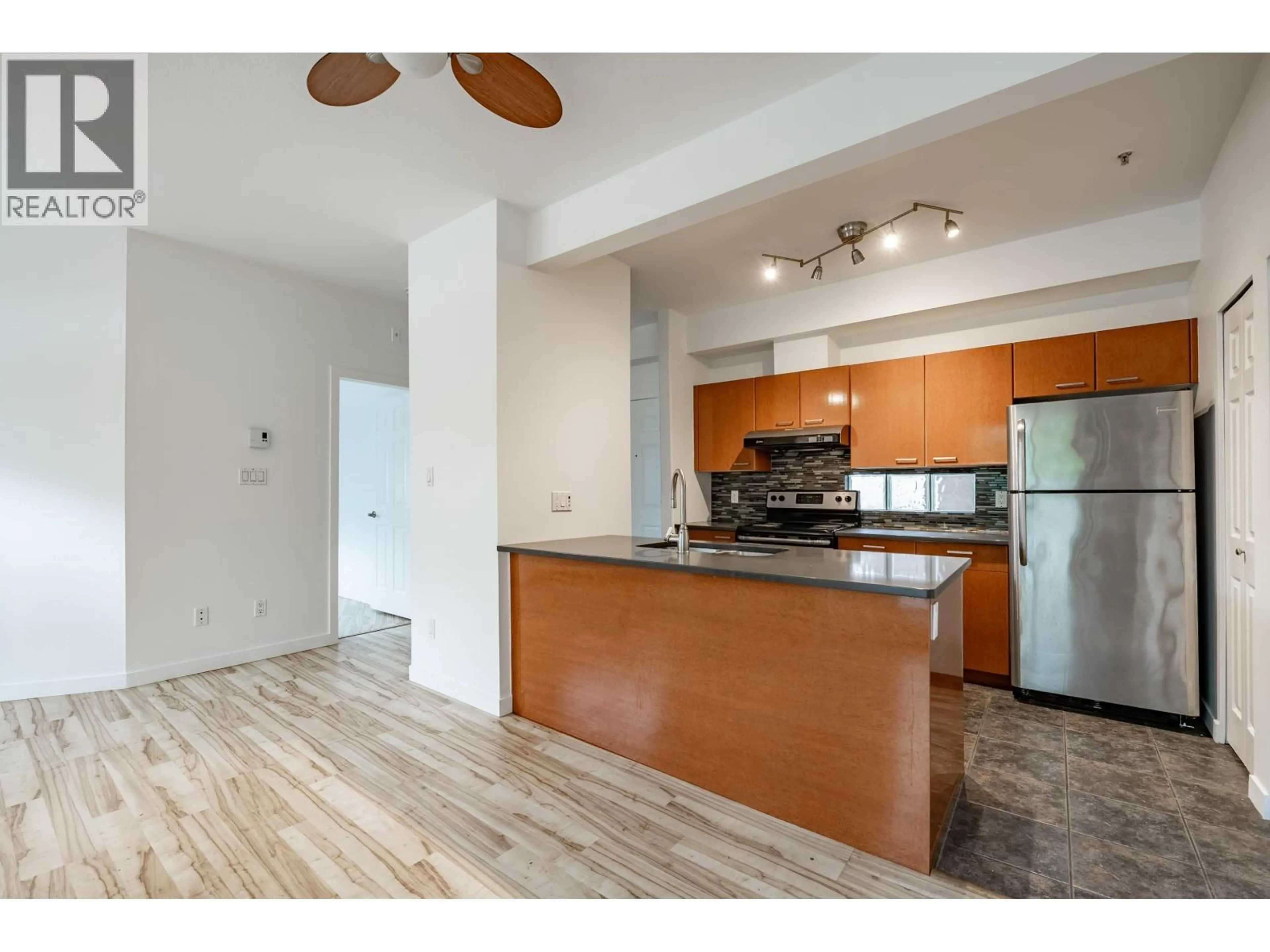 Open concept kitchen, unknown for 103 - 1688 8TH AVENUE, Vancouver British Columbia V5N1T5