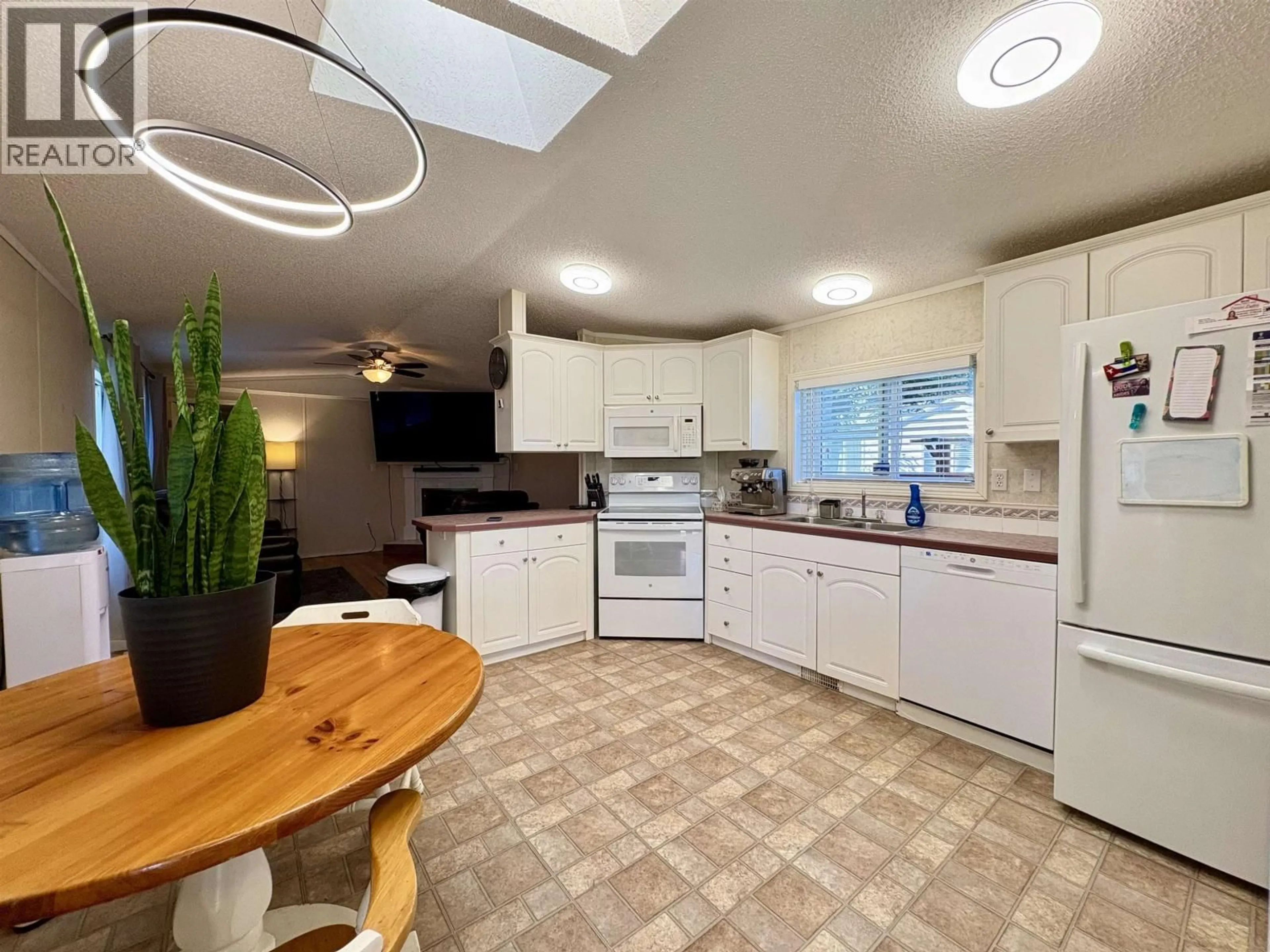 Open concept kitchen, ceramic/tile floor for 2989 THEE PLACE, Prince George British Columbia V2K5B8