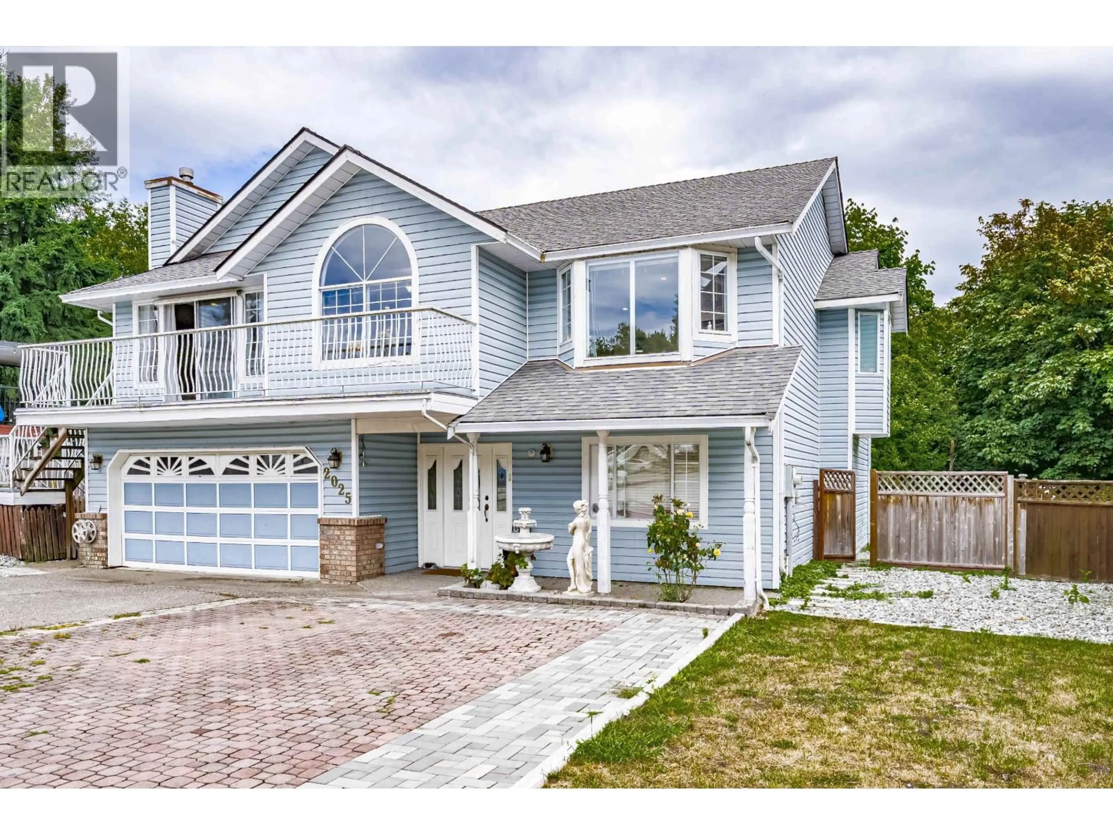 Home with vinyl exterior material, street for 2025 POEL PLACE, Port Coquitlam British Columbia V3C5H9
