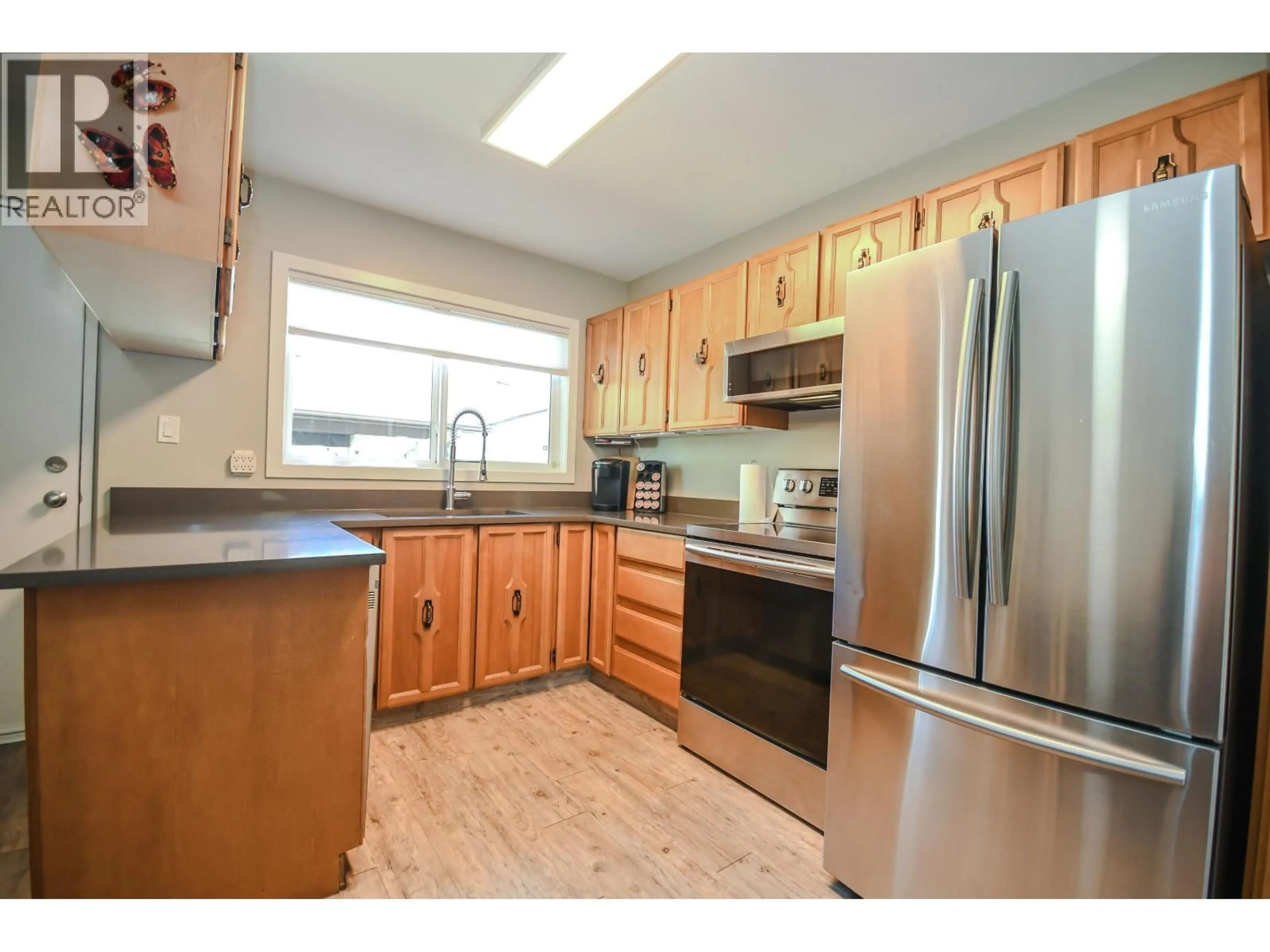 Standard kitchen, wood/laminate floor for 7536 ST KEVIN PLACE, Prince George British Columbia V2N4L3