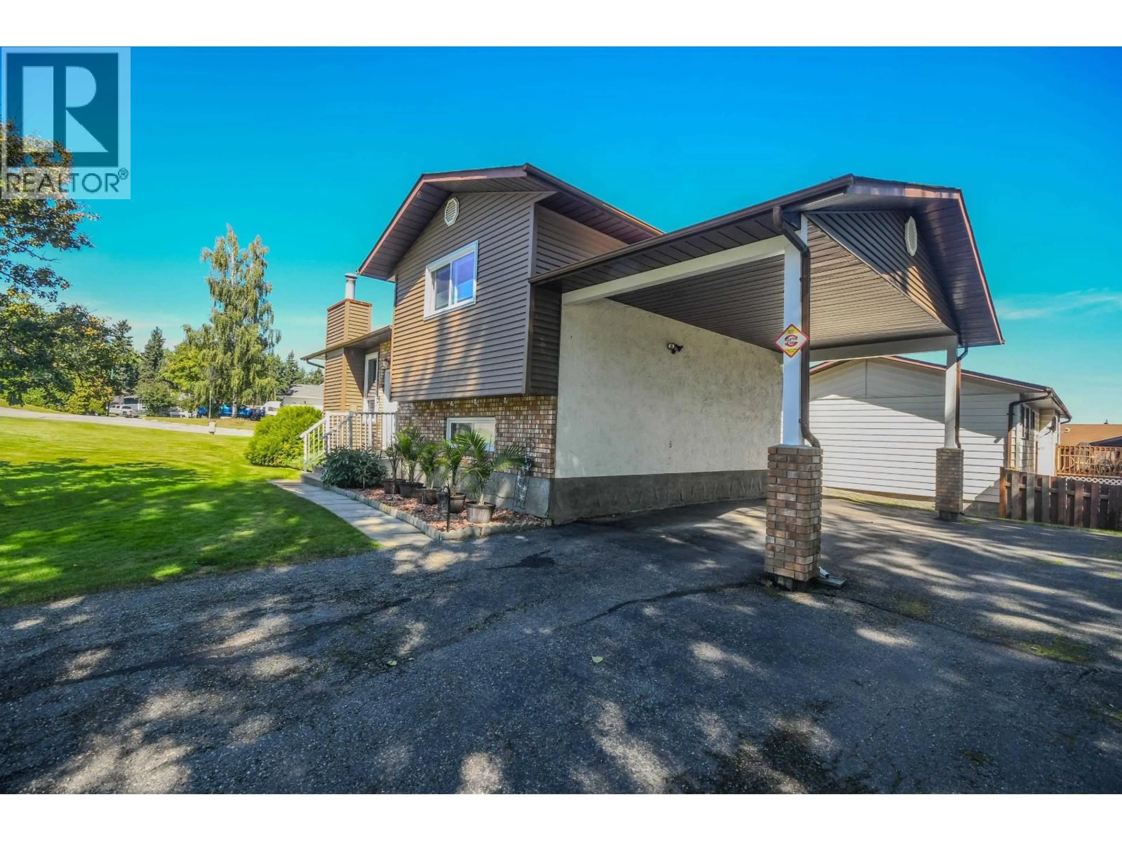 Home with vinyl exterior material, street for 7536 ST KEVIN PLACE, Prince George British Columbia V2N4L3