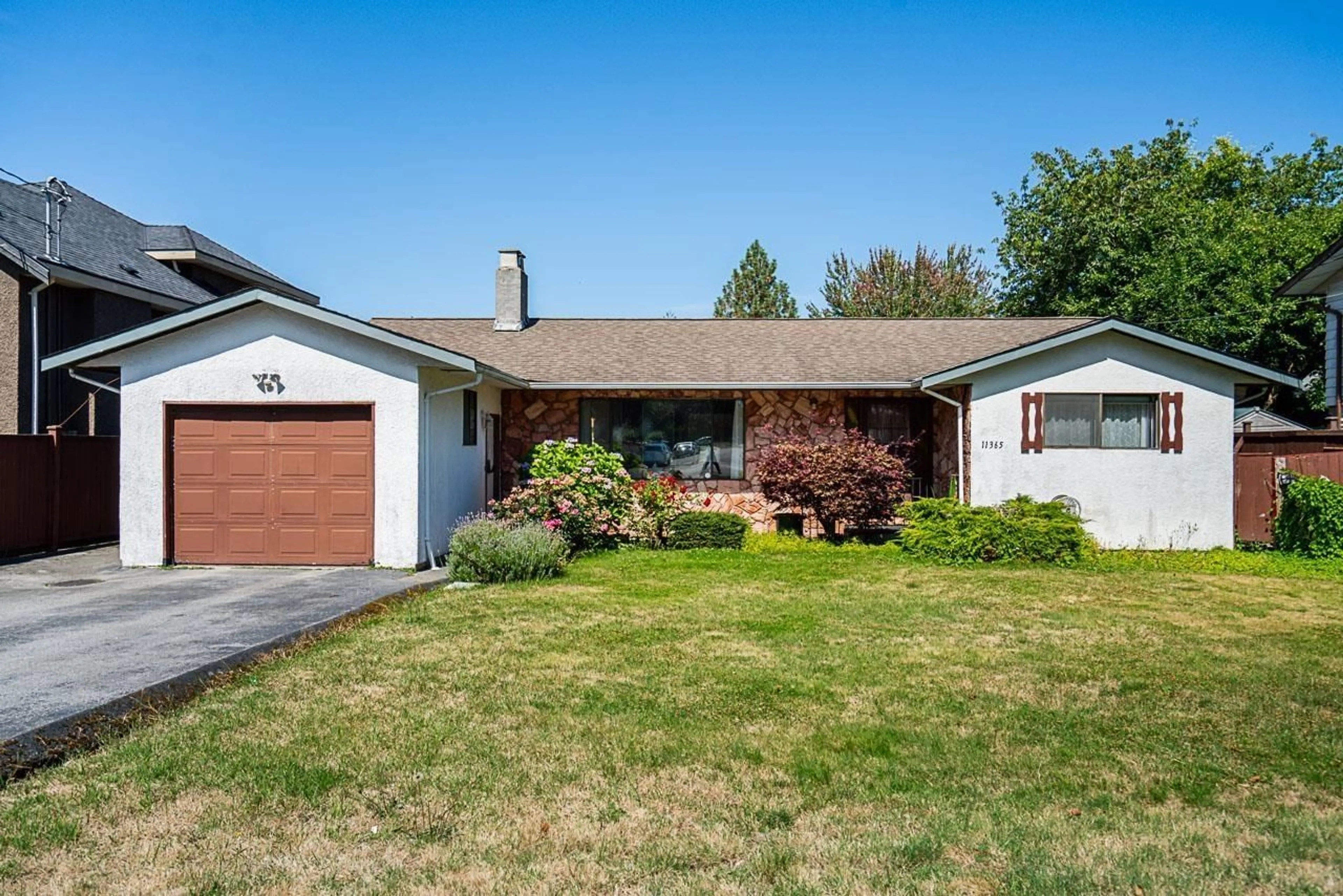 Home with vinyl exterior material, street for 11365 86, Delta British Columbia V4C2X1