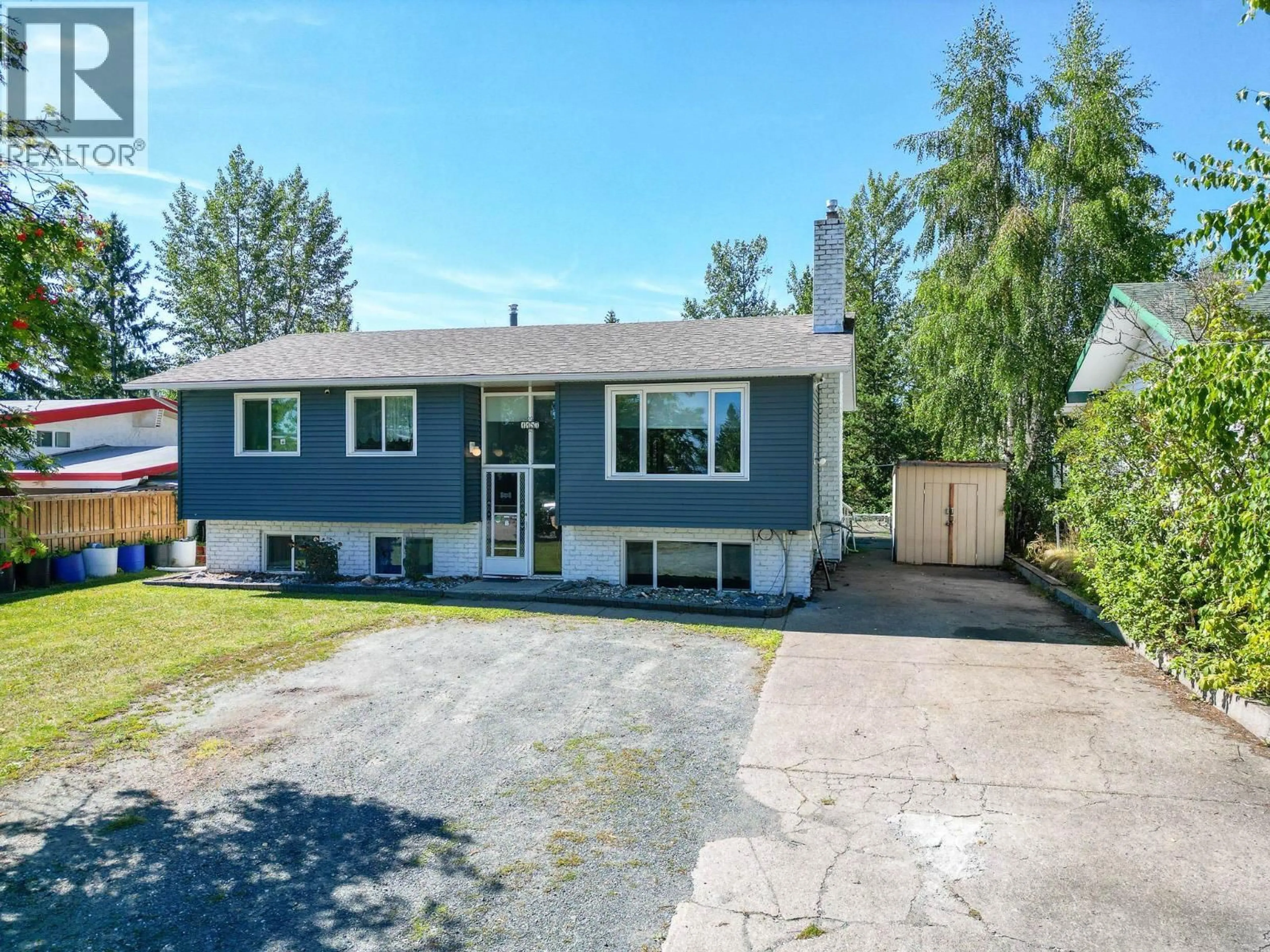 Home with vinyl exterior material, street for 1157 BABINE CRESCENT, Prince George British Columbia V2M3X7
