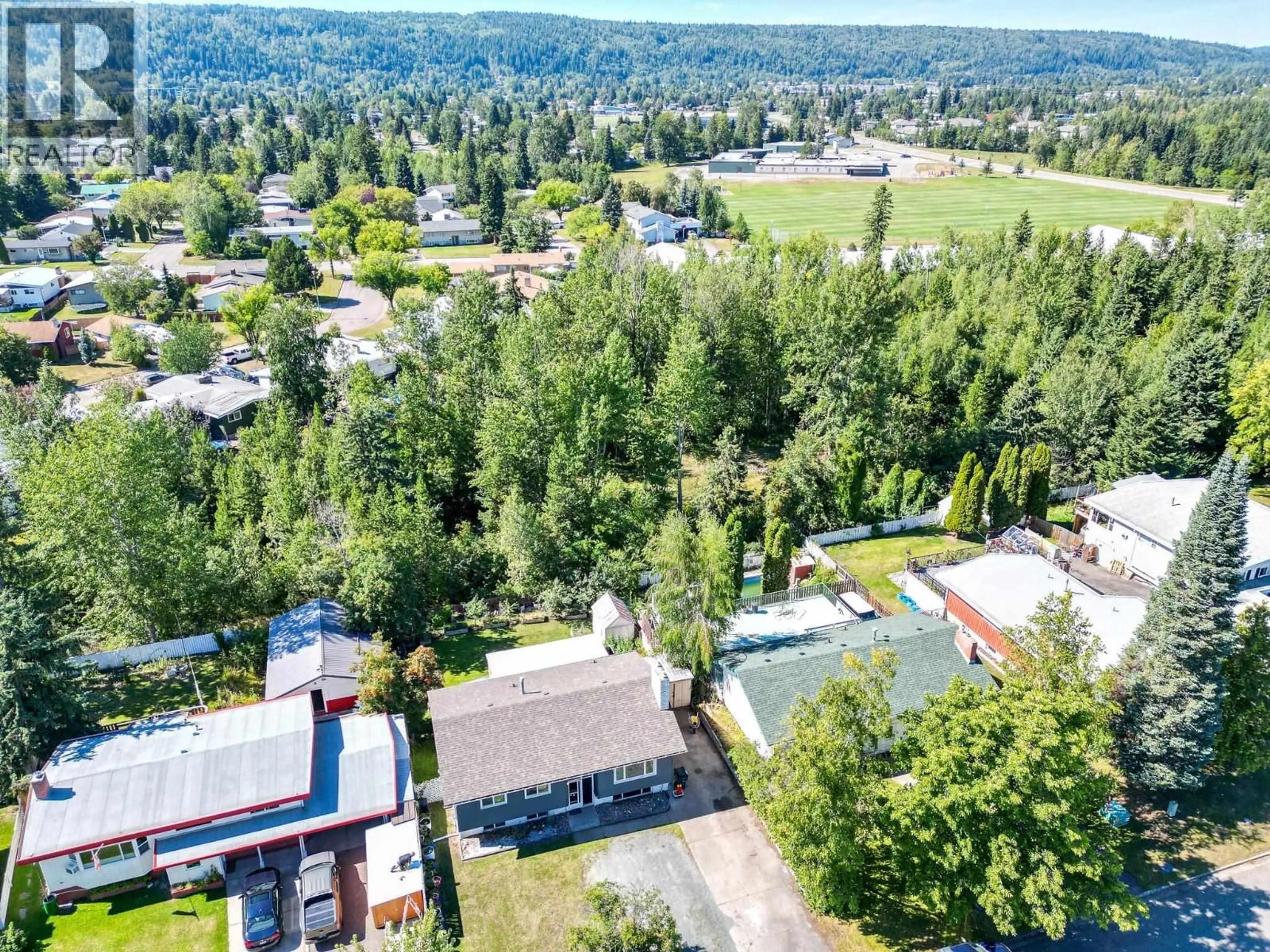 A pic from outside/outdoor area/front of a property/back of a property/a pic from drone, mountain view for 1157 BABINE CRESCENT, Prince George British Columbia V2M3X7