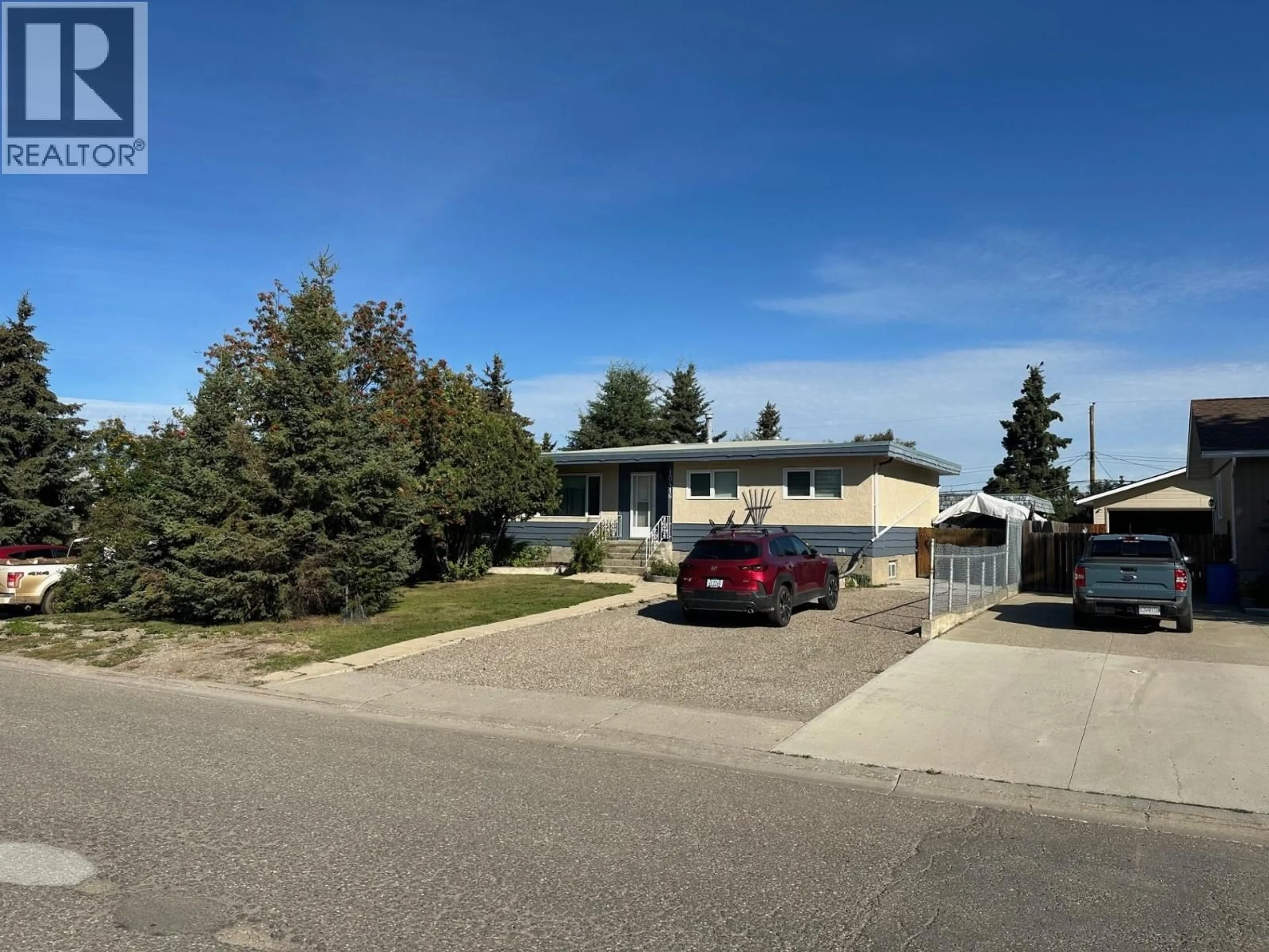 A pic from outside/outdoor area/front of a property/back of a property/a pic from drone, street for 10416 111 AVENUE, Fort St. John British Columbia V1J2V6