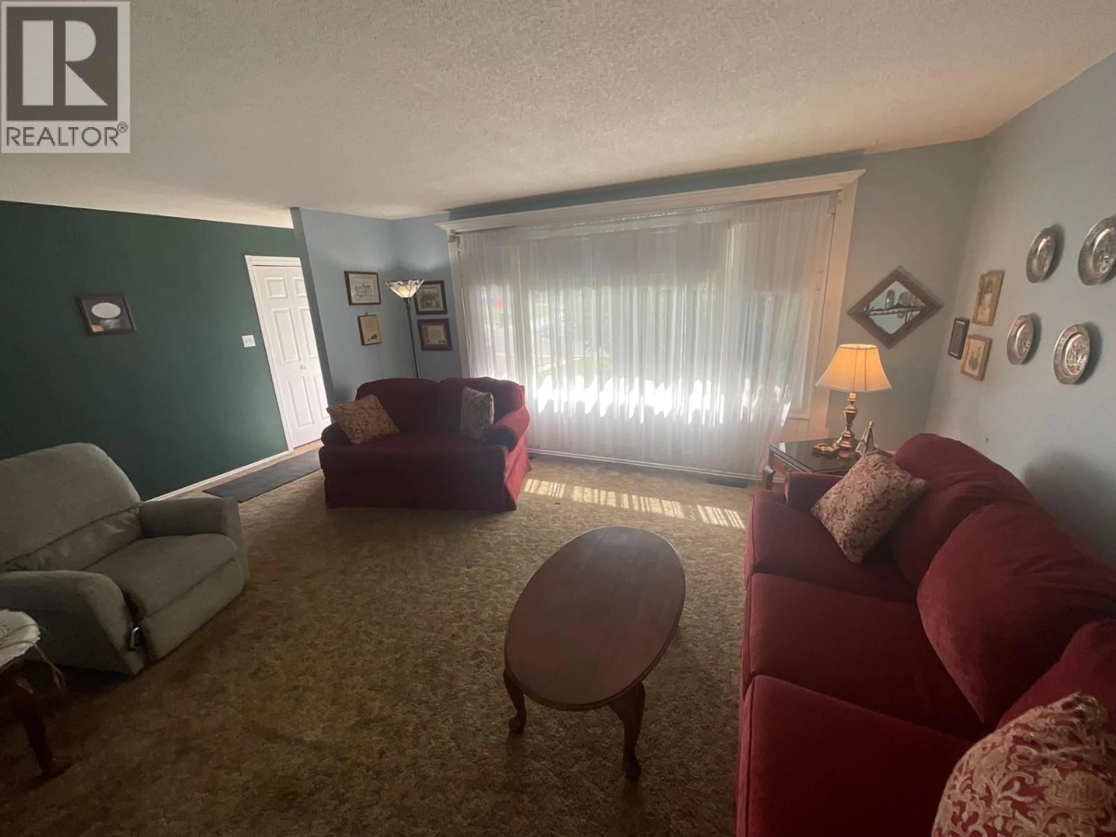 Living room with furniture, unknown for 10416 111 AVENUE, Fort St. John British Columbia V1J2V6