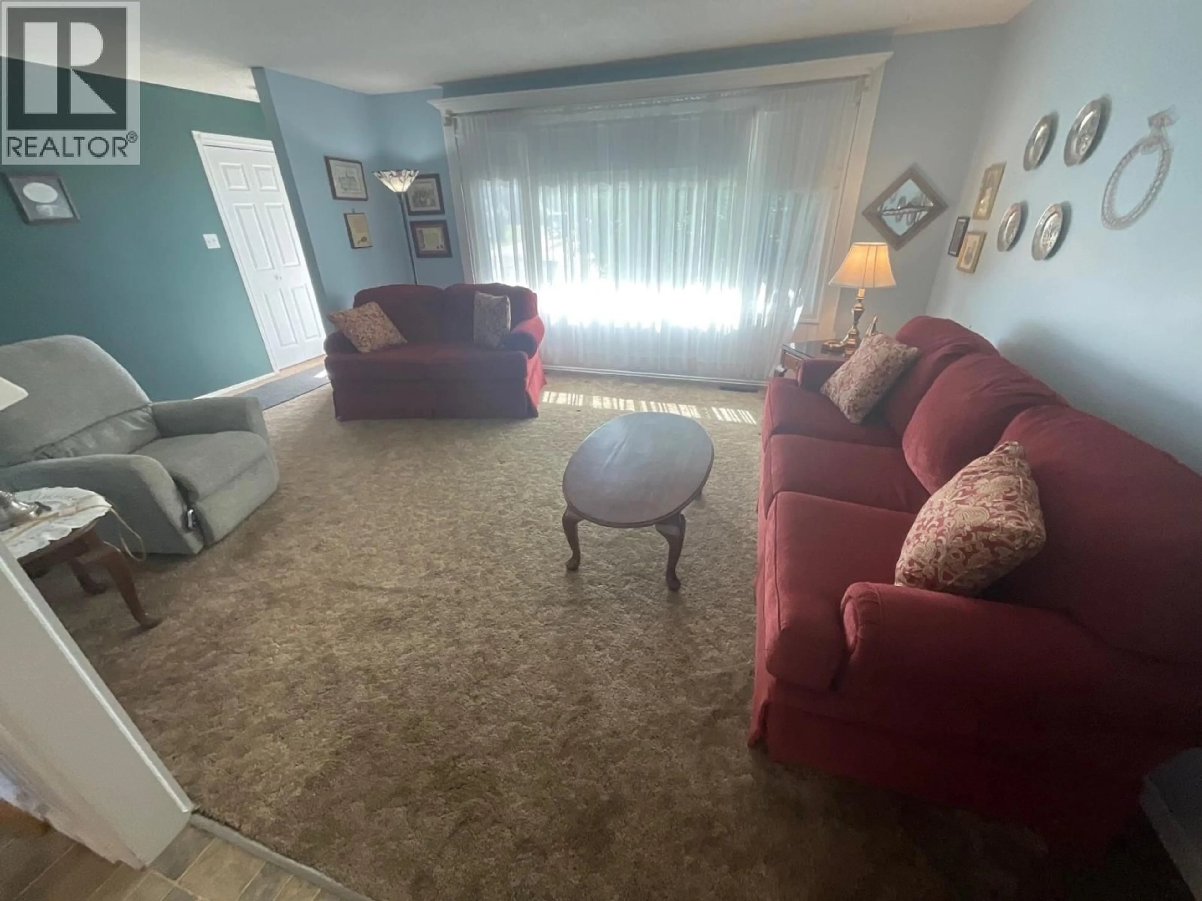 Living room with furniture, unknown for 10416 111 AVENUE, Fort St. John British Columbia V1J2V6