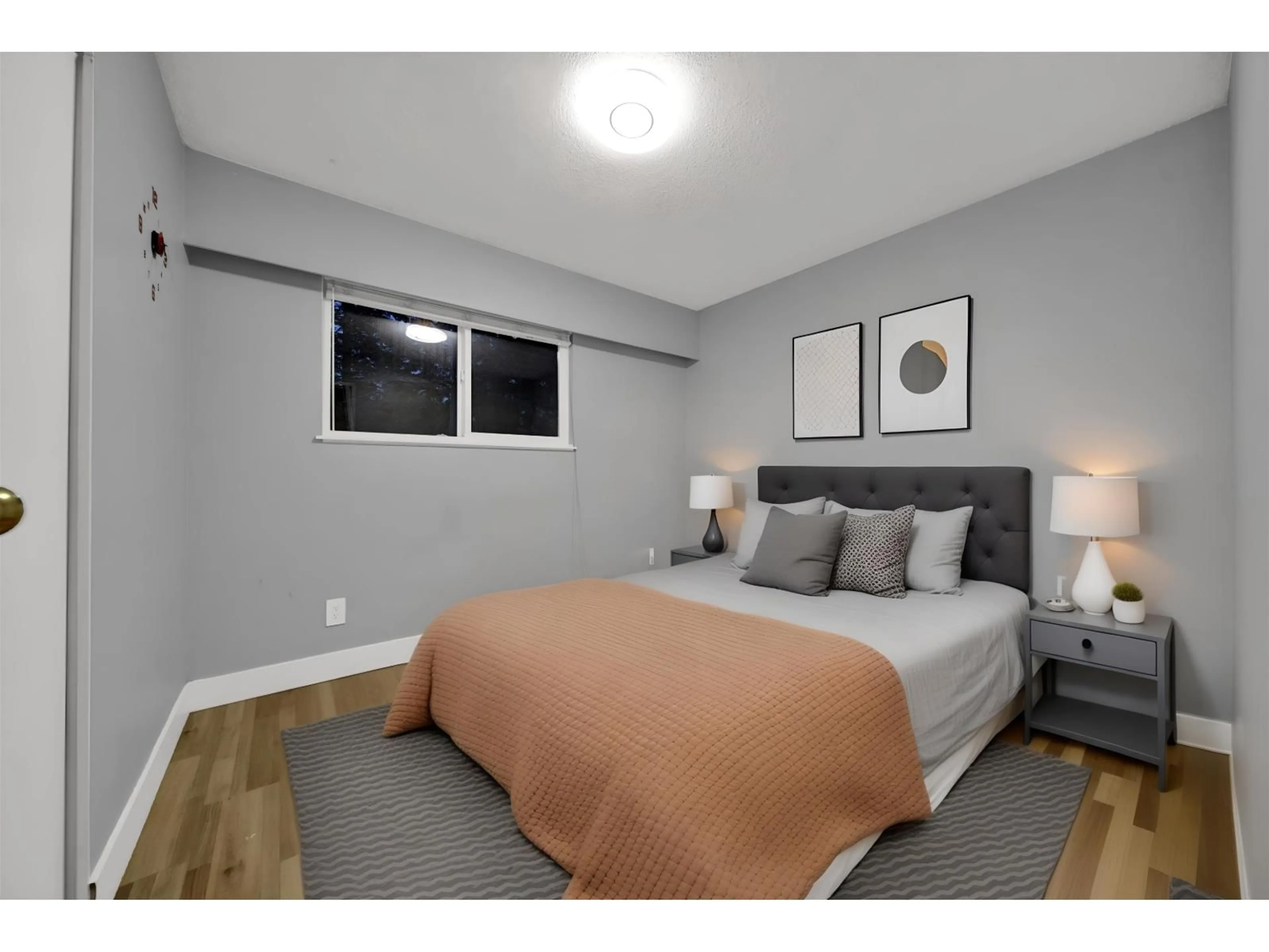 Bedroom with bed, wood/laminate floor for 7085 140A, Surrey British Columbia V3W5L4