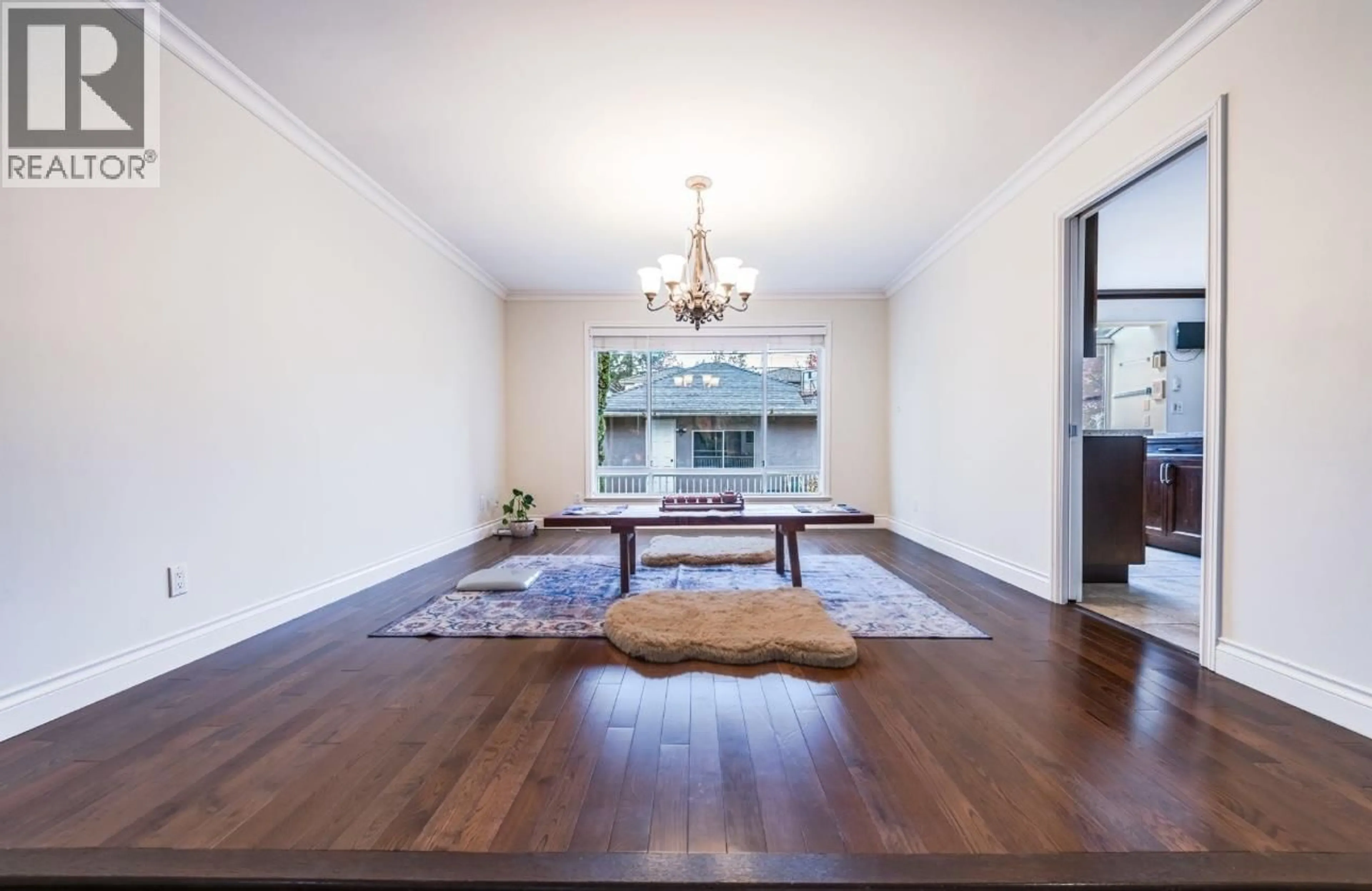 Dining room, wood/laminate floor for 4570 13TH AVENUE, Vancouver British Columbia V6R2V4