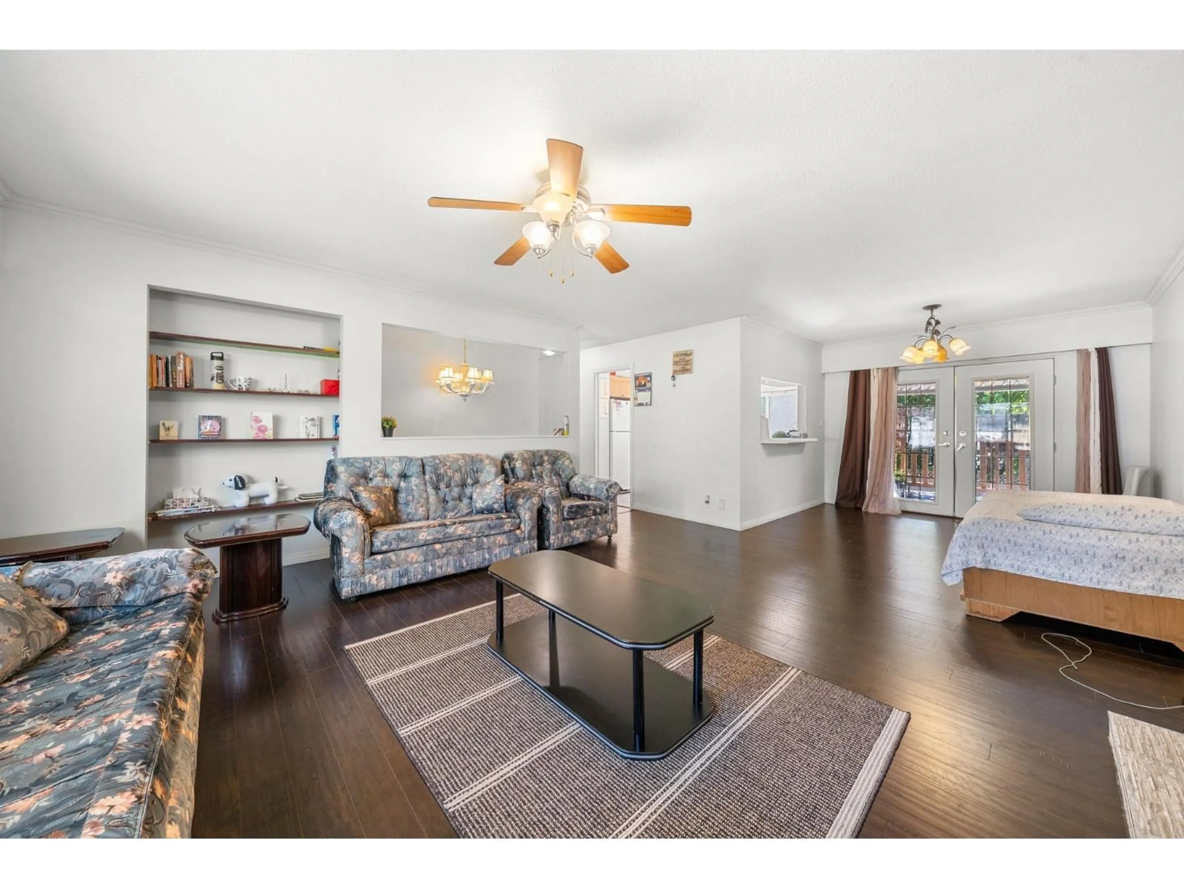 Living room with furniture, wood/laminate floor for 11780 85A, Delta British Columbia V4C2V6