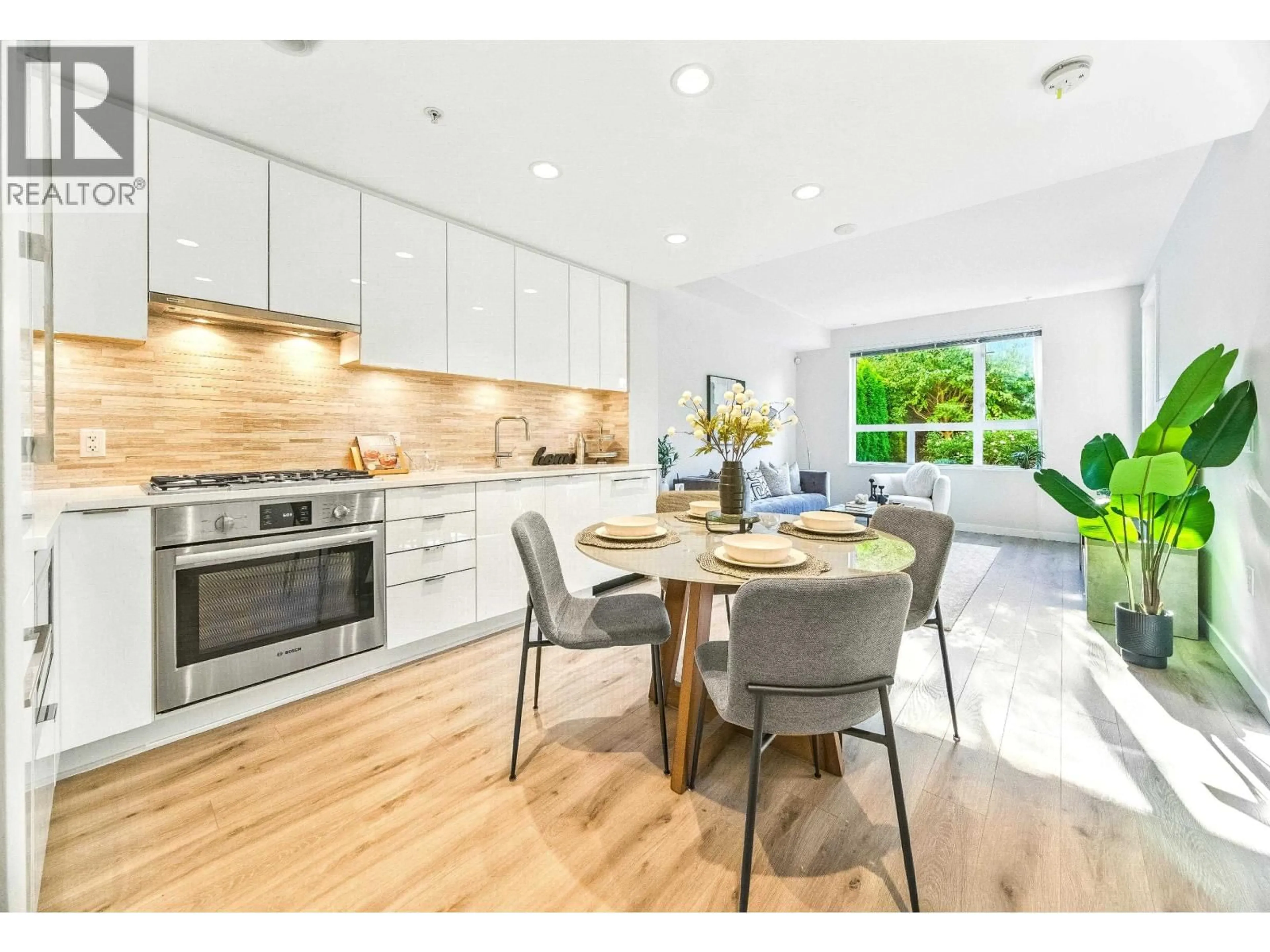 Open concept kitchen, ceramic/tile floor for 109 - 9233 ODLIN ROAD, Richmond British Columbia V6X0V4