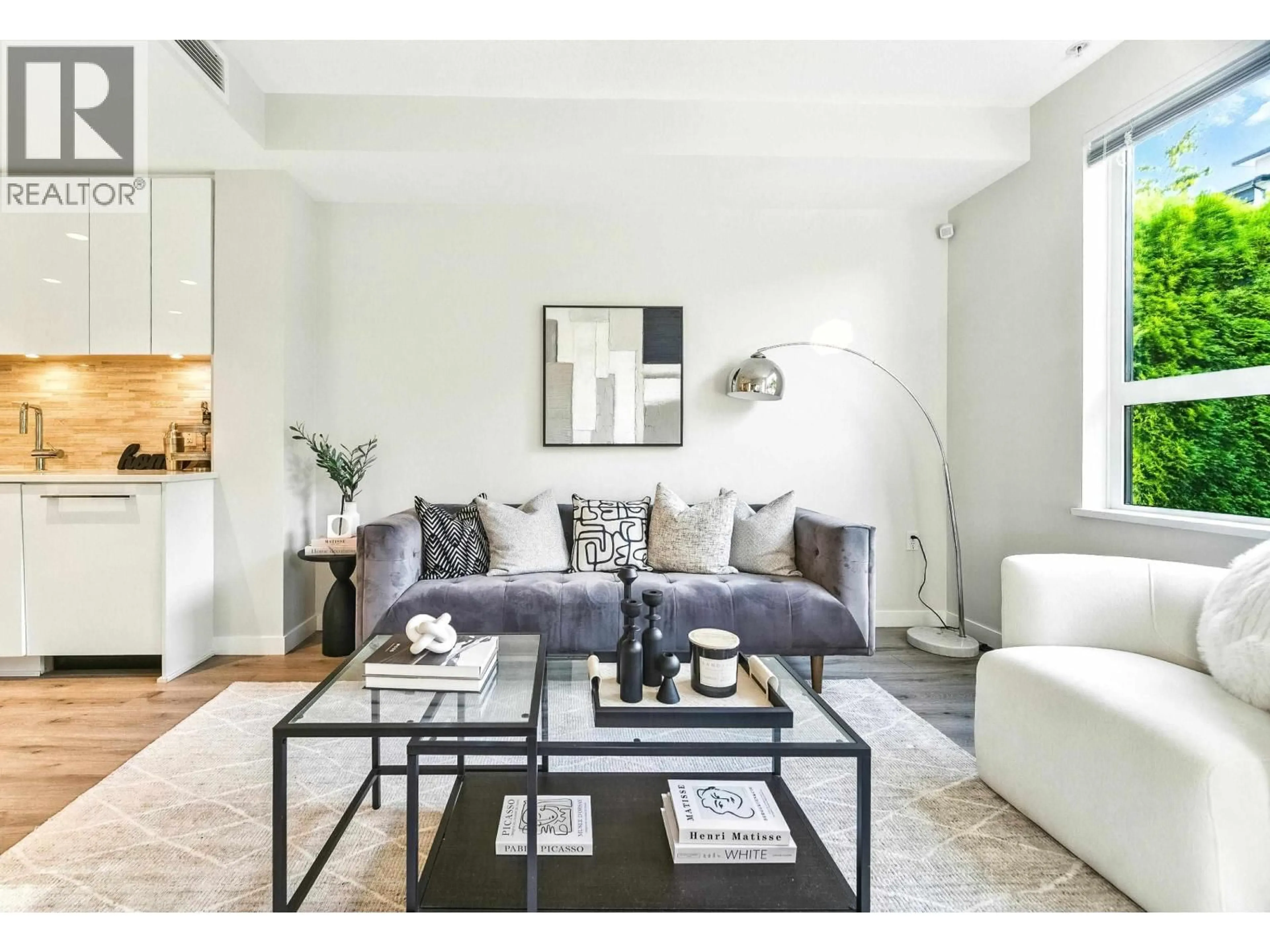 Living room with furniture, unknown for 109 - 9233 ODLIN ROAD, Richmond British Columbia V6X0V4