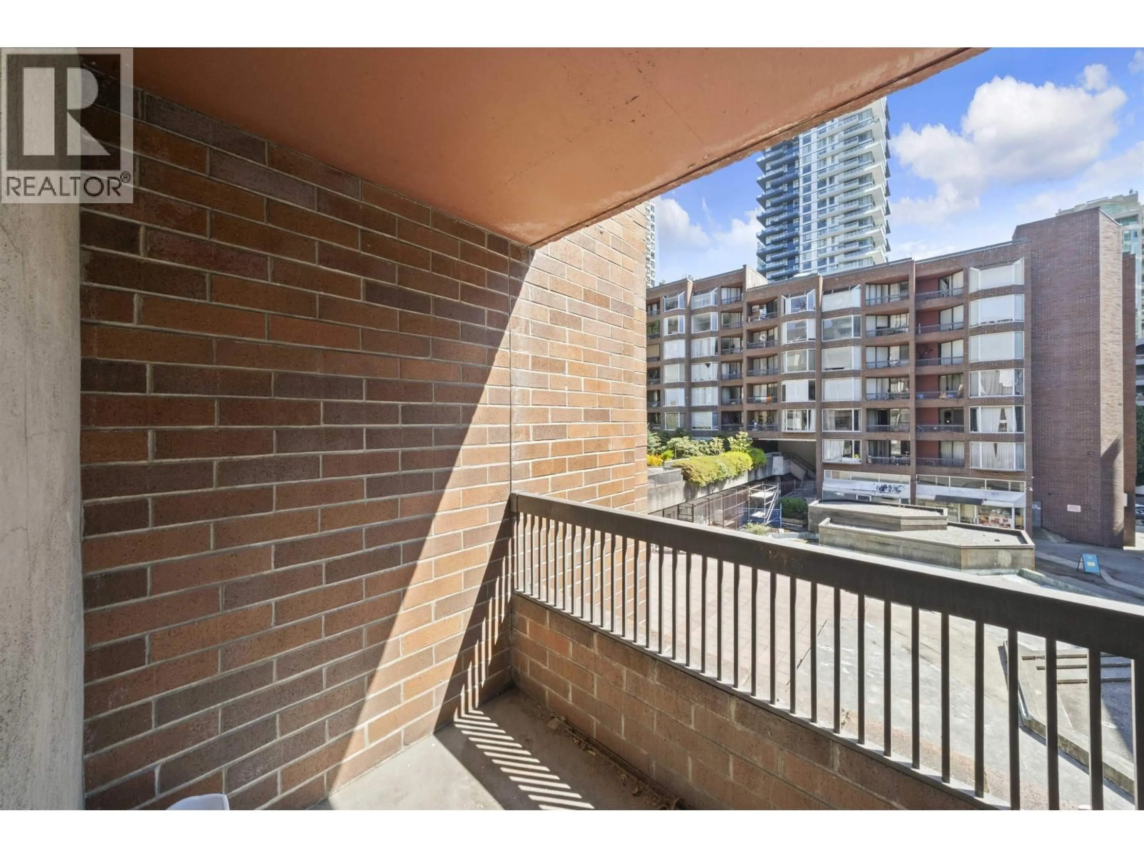 Balcony in the apartment, city buildings view from balcony for 313 - 1330 BURRARD STREET, Vancouver British Columbia V6Z2B8
