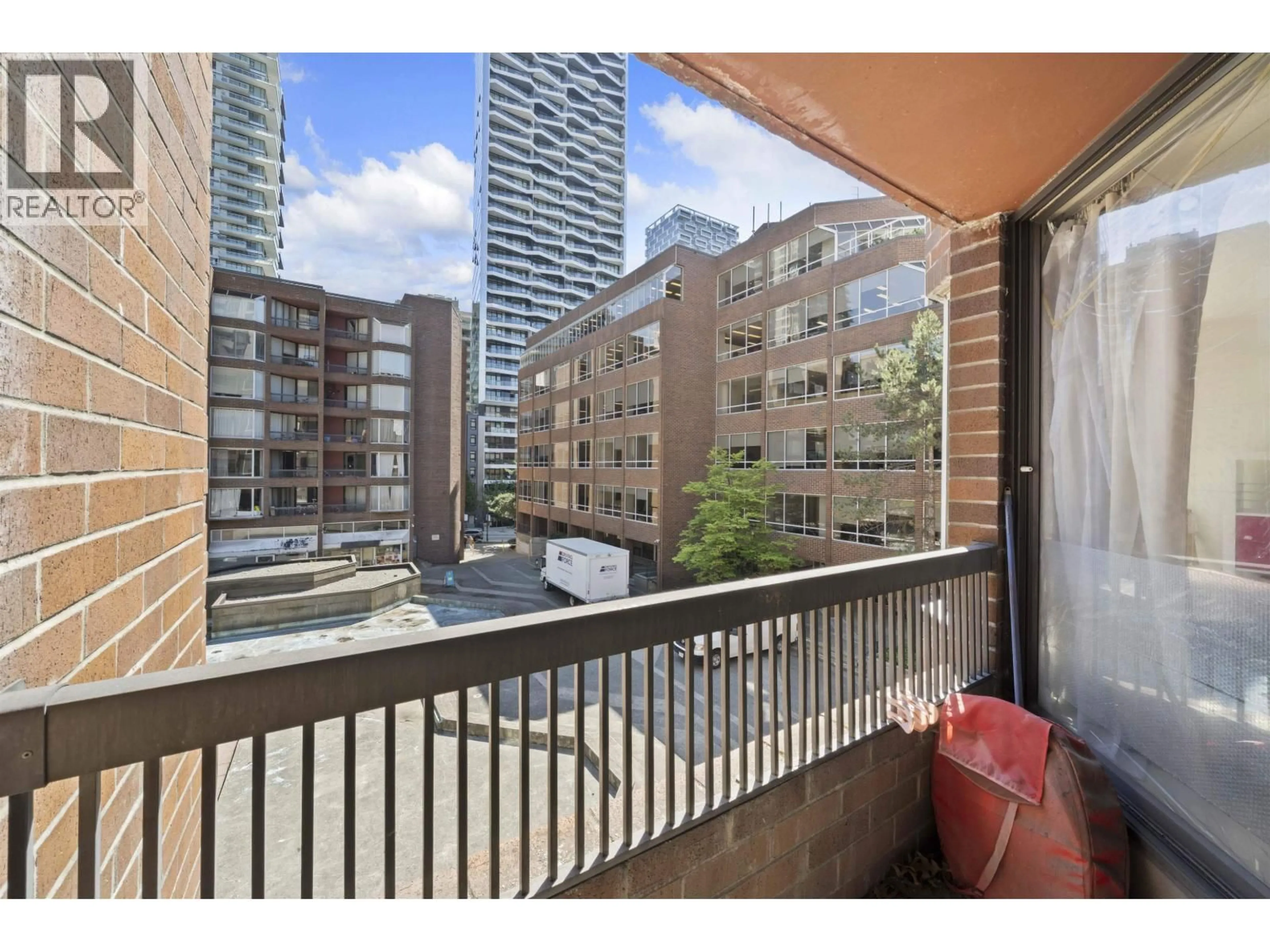 Balcony in the apartment, city buildings view from balcony for 313 - 1330 BURRARD STREET, Vancouver British Columbia V6Z2B8