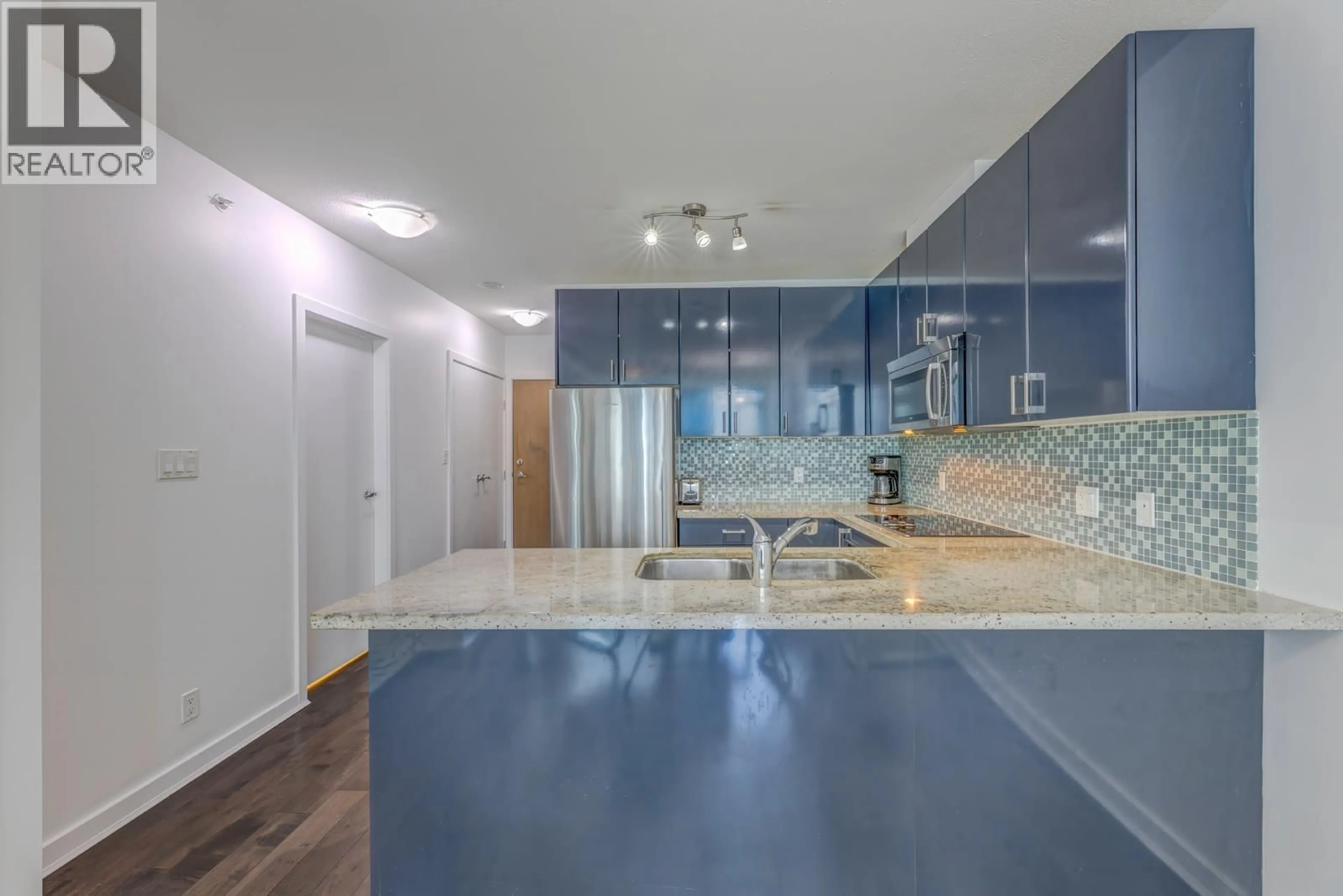 Contemporary kitchen, ceramic/tile floor for 603 - 1188 PENDER STREET, Vancouver British Columbia V6E0A2