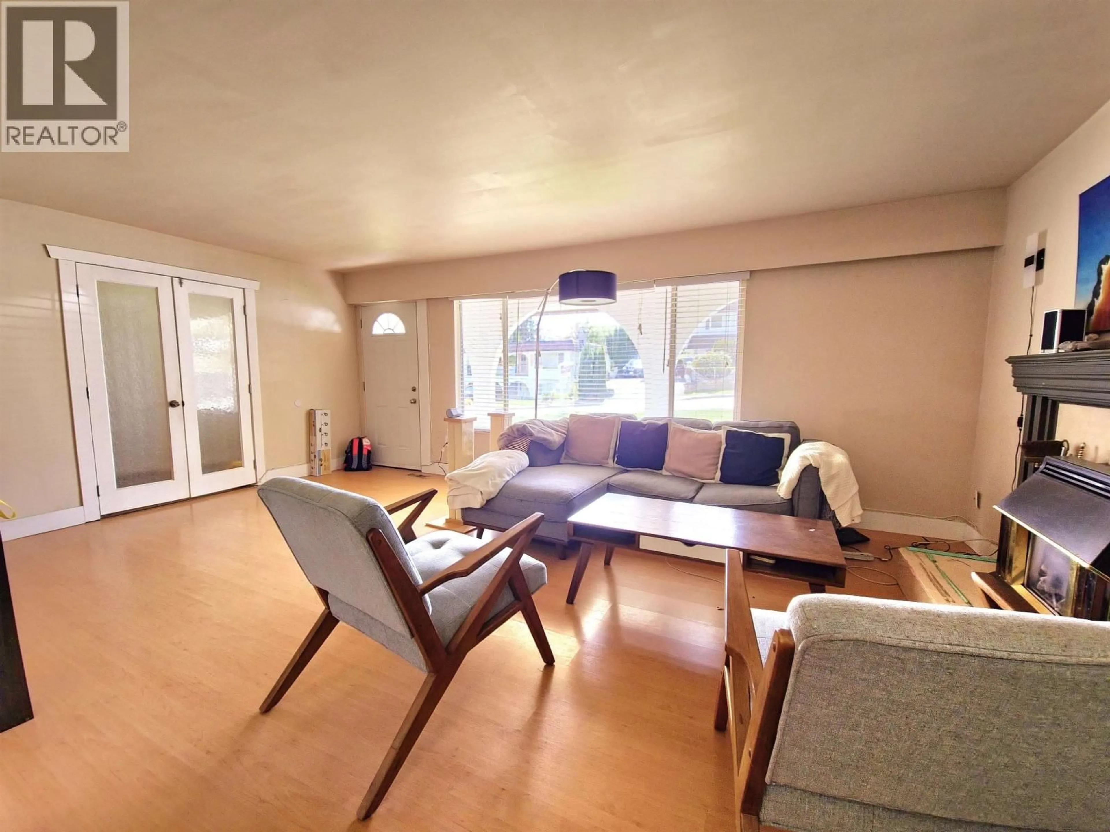 Living room with furniture, wood/laminate floor for 5685 FOREST STREET, Burnaby British Columbia V5G1X5