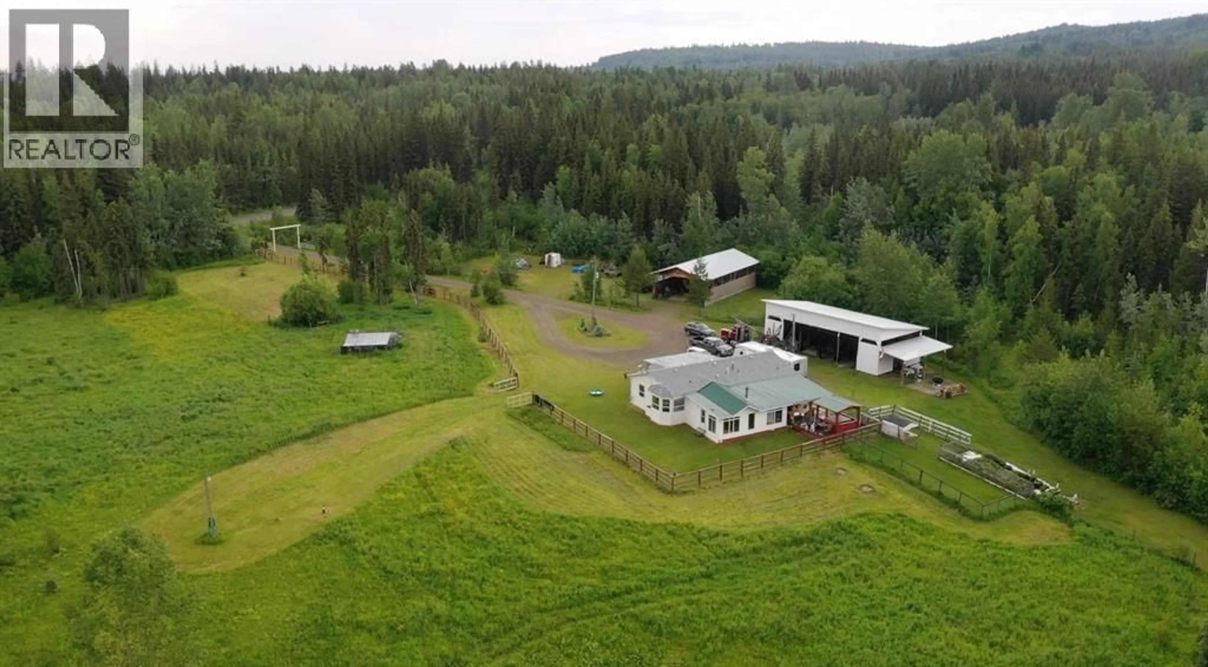 A pic from outside/outdoor area/front of a property/back of a property/a pic from drone, unknown for 10780 HORSESHOE DRIVE, Prince George British Columbia V2N5W8